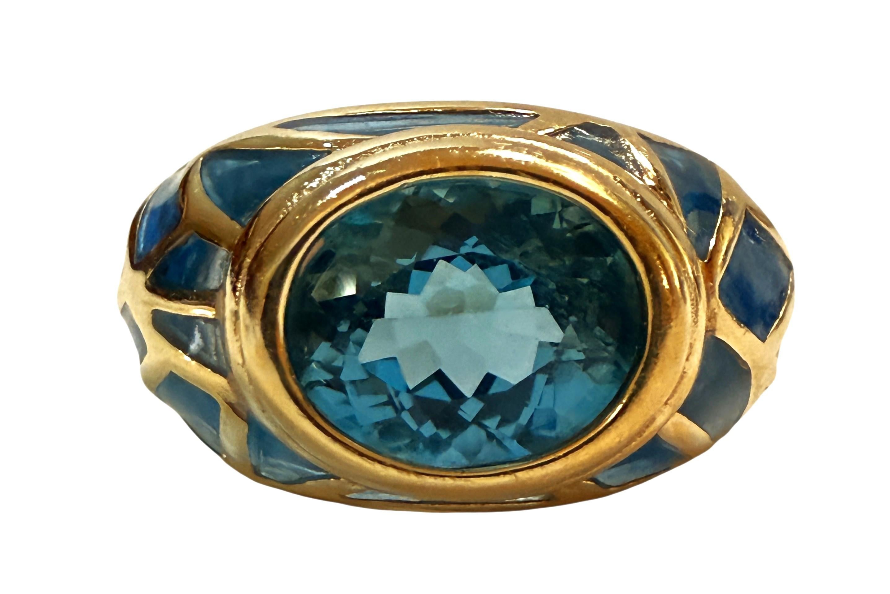 ¡Qué anillo tan bonito!  ¡Es un diseño espectacular!  El anillo es de la talla 8.  Es una hermosa piedra de corte ovalado de fantasía y mide 2,54 quilates.  Es una piedra de muy alta calidad.    Mide 10 x 8 mm.  La piedra se exhibe con una doble