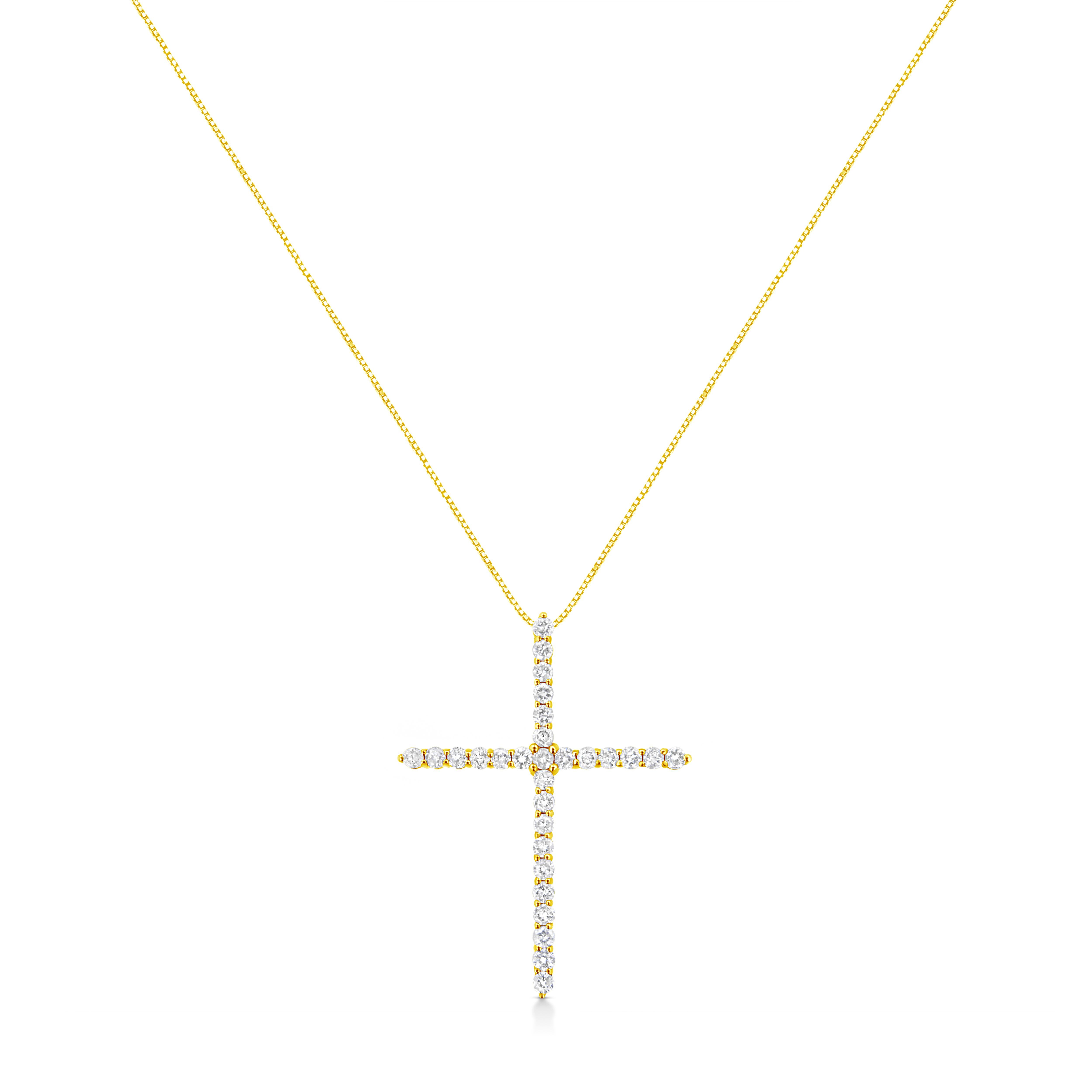 This glamorous cross pendant is embellished with a stunning total carat weight of 3 cttw. Beautiful and natural round-cut diamonds glimmer in this necklace and are set in the finest 10k yellow gold that will shine on your necklace. This piece will