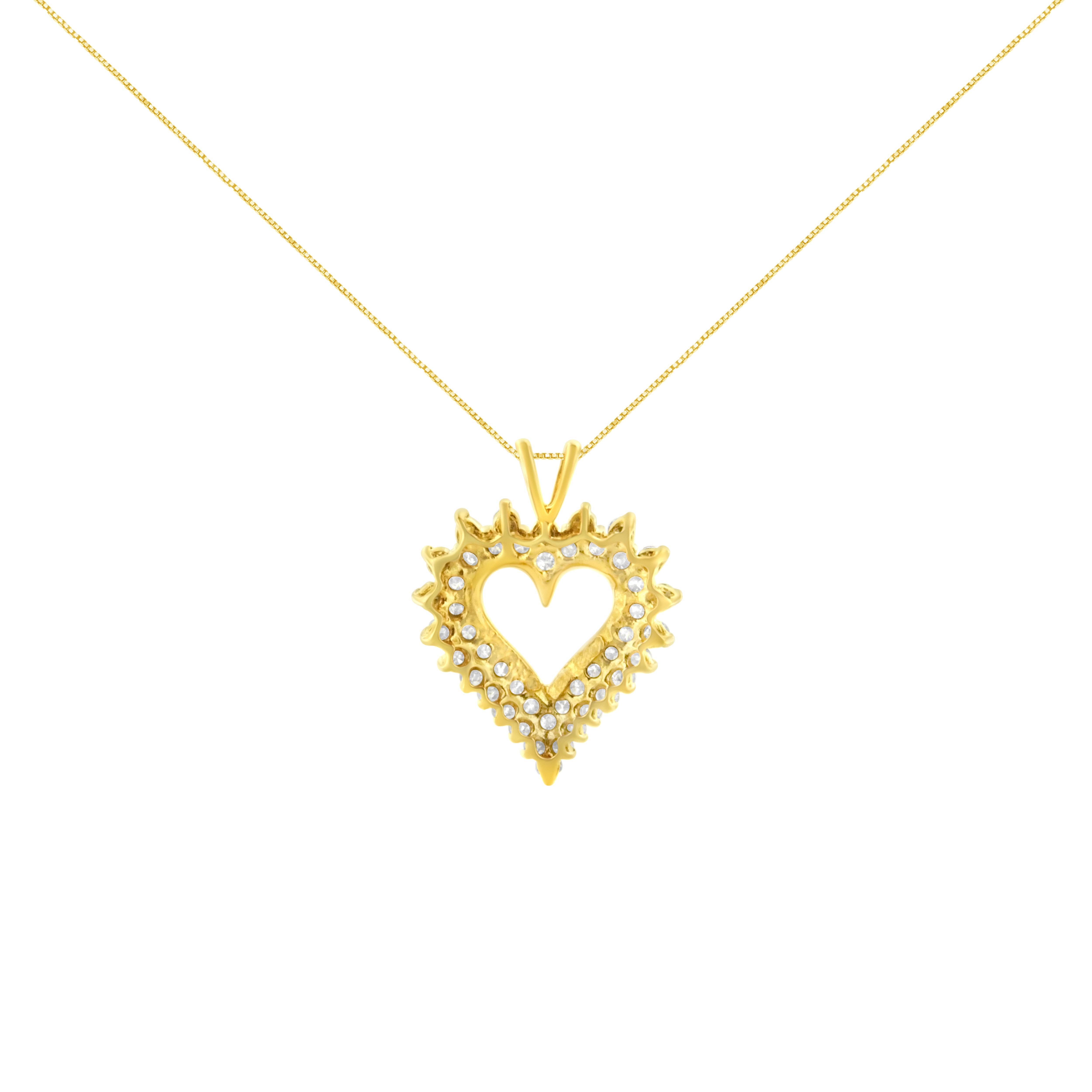 Two rows of natural, sparkling diamonds are set in warm 10K yellow gold to create a stunning open heart design in this beautiful pendant necklace for her. This pendant has 46 round diamonds, that are I1-I2 in clarity and J-K in color; each diamond