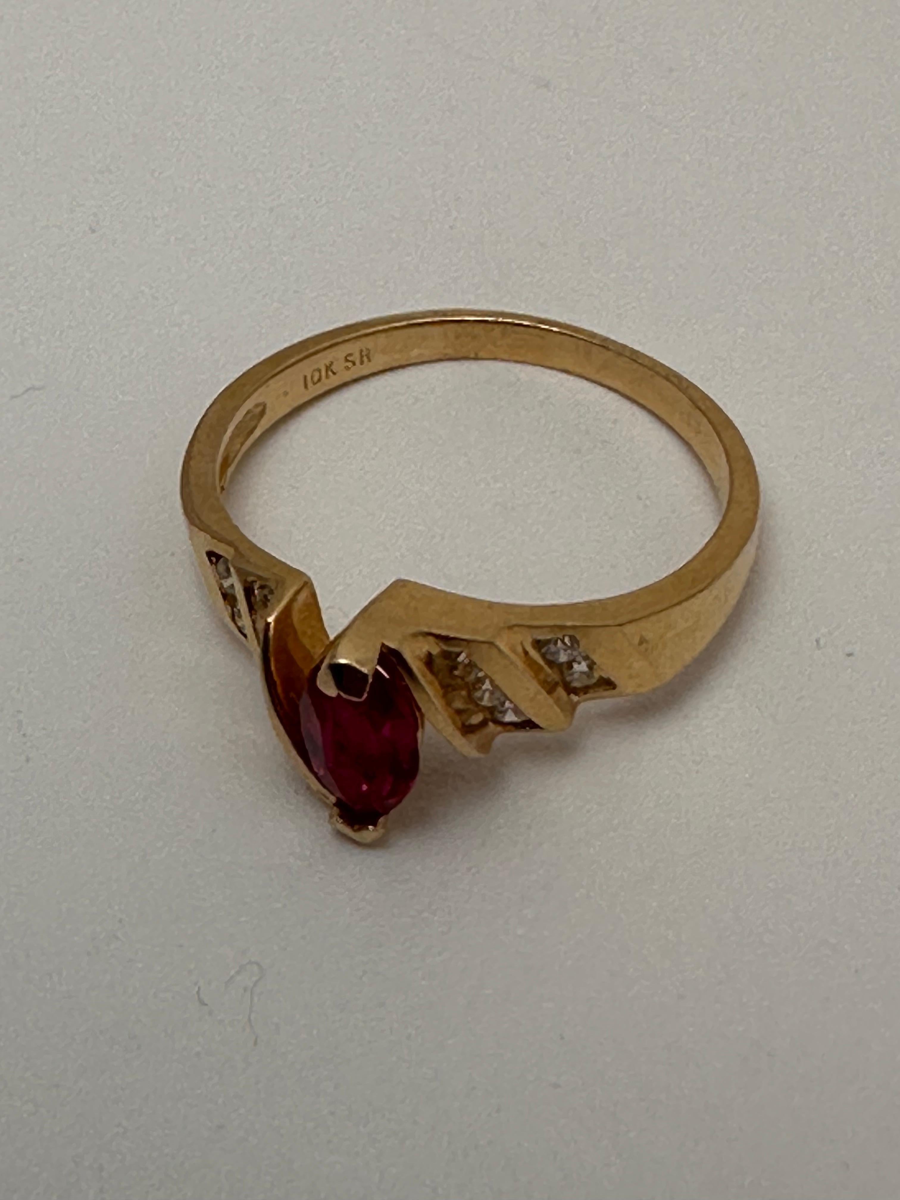 Marquise Cut 10k Yellow Gold 4 x 8mm Marquise Ruby with 10 Channel Set Diamonds Ring Size 7 For Sale