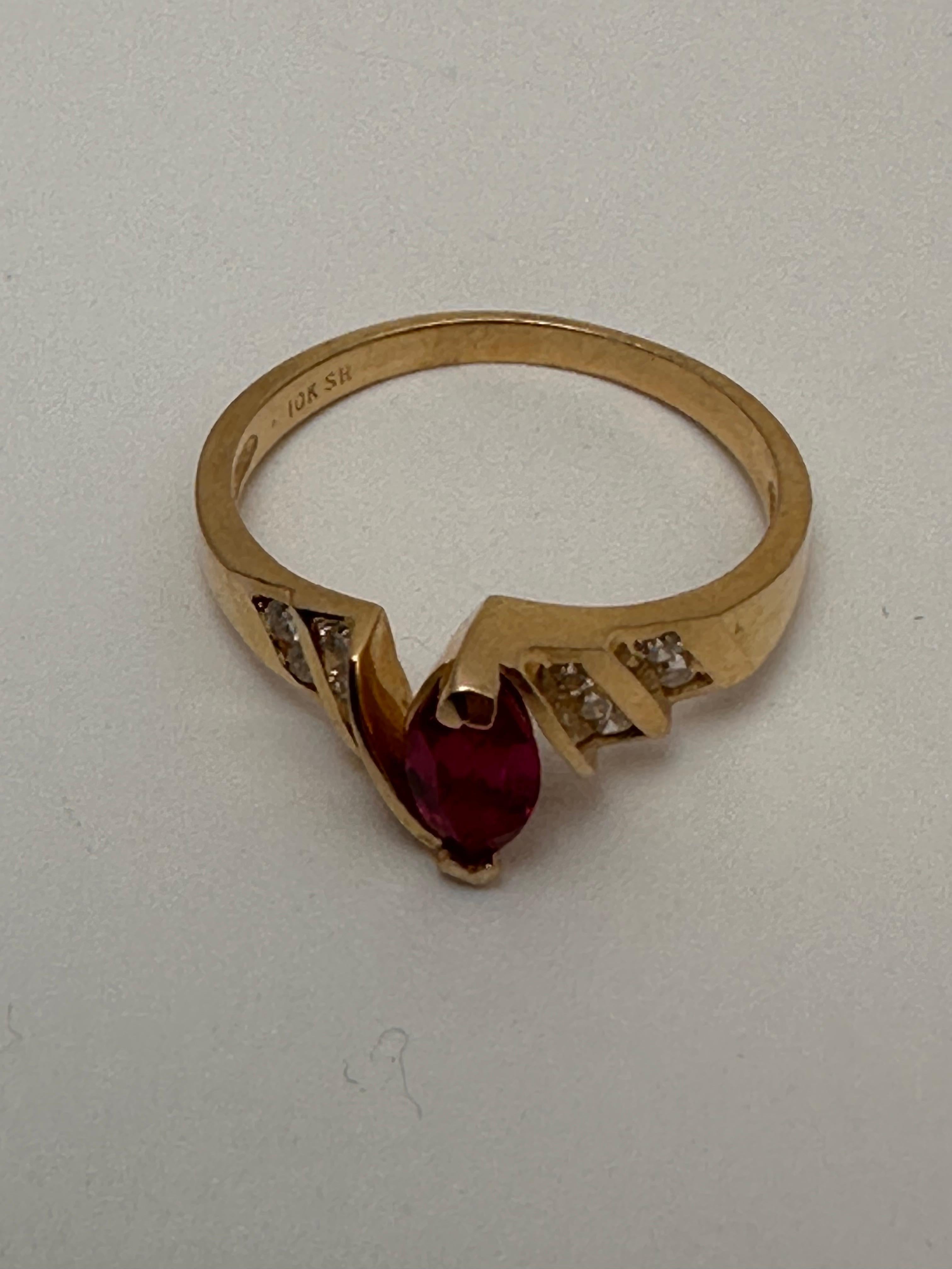 Women's 10k Yellow Gold 4 x 8mm Marquise Ruby with 10 Channel Set Diamonds Ring Size 7 For Sale