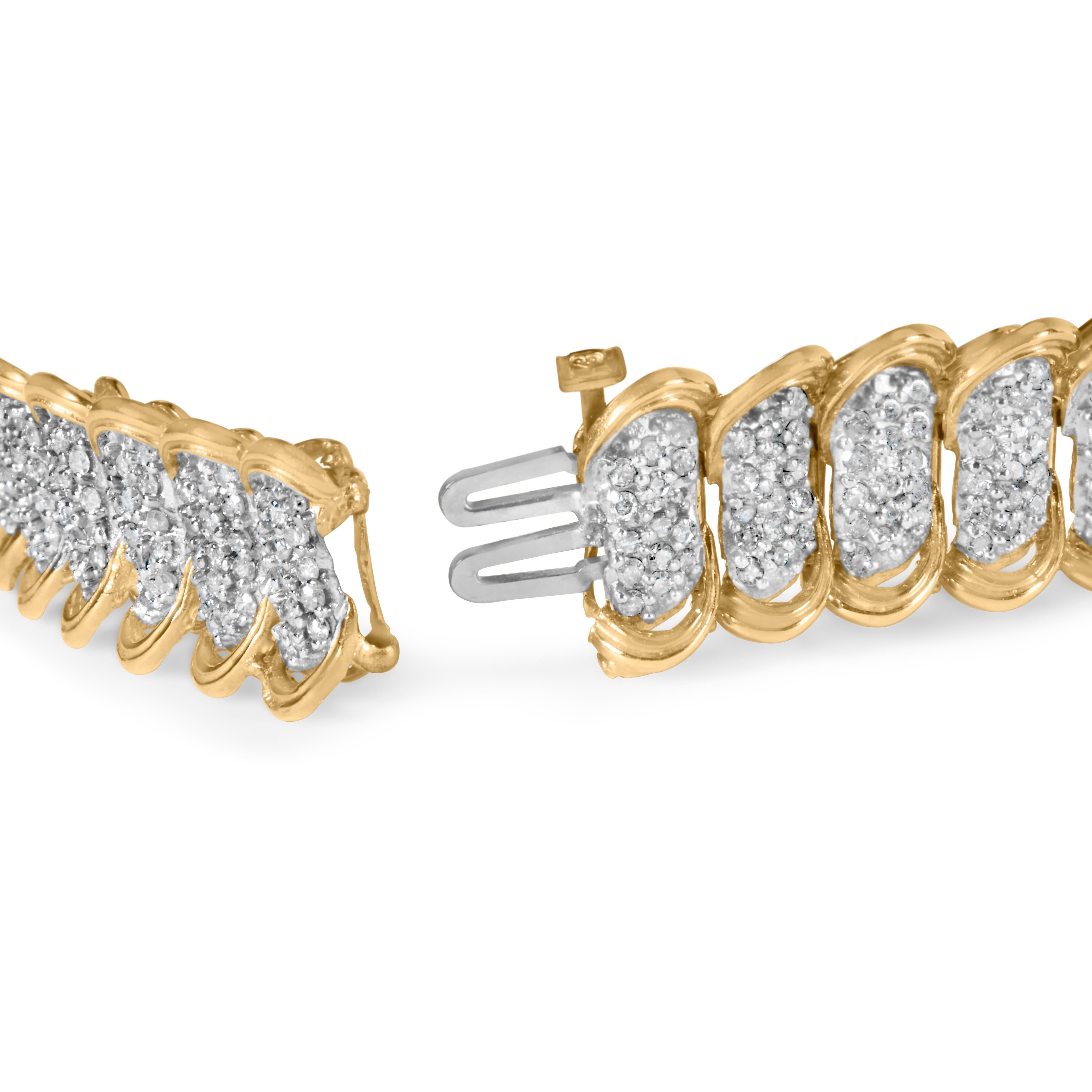 Indulge in the luxurious beauty of this exquisite 10K yellow gold pave diamond link bracelet. Adorned with 480 round diamonds, the bracelet's 4.0 cttw total weight radiates a breathtaking brilliance, each diamond boasting a natural origin, I-J