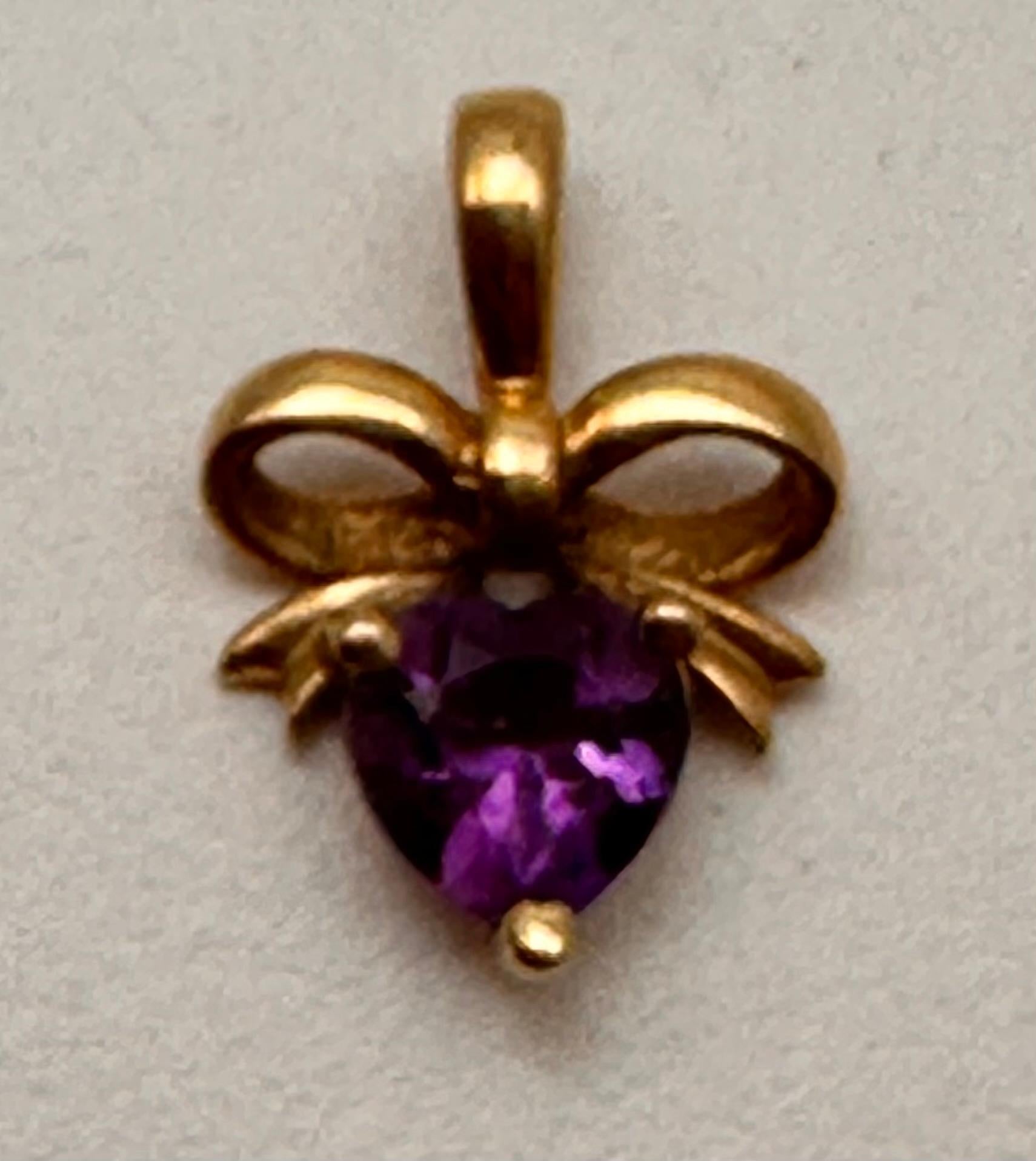 10k Yellow Gold ~ 6mm Amethyst Heart Set in a  Bow Setting  3/8