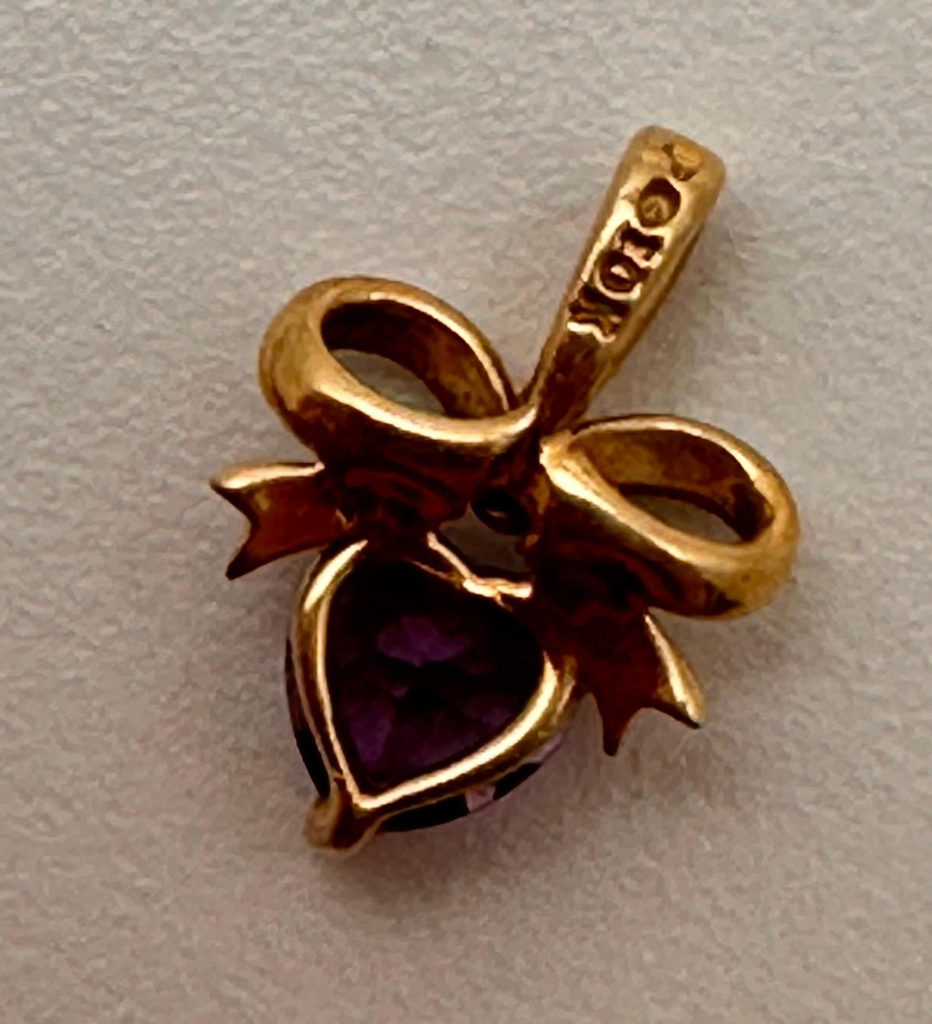 Women's 10k Yellow Gold ~ 6mm Amethyst Heart Set in a  Bow Setting  3/8