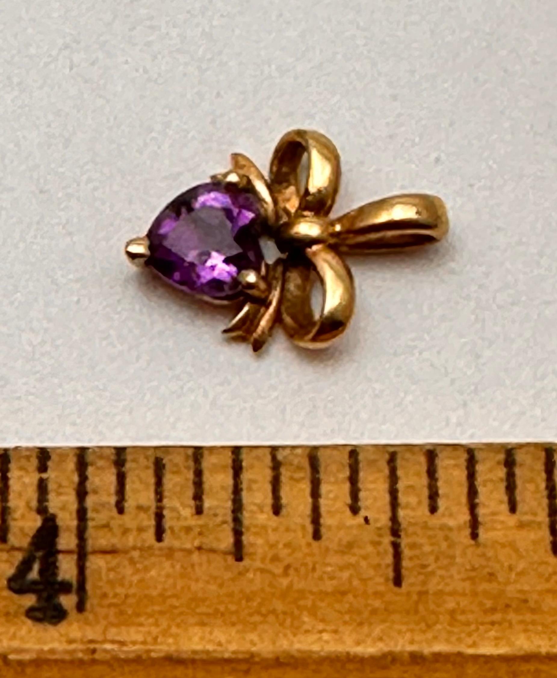 10k Yellow Gold ~ 6mm Amethyst Heart Set in a  Bow Setting  3/8