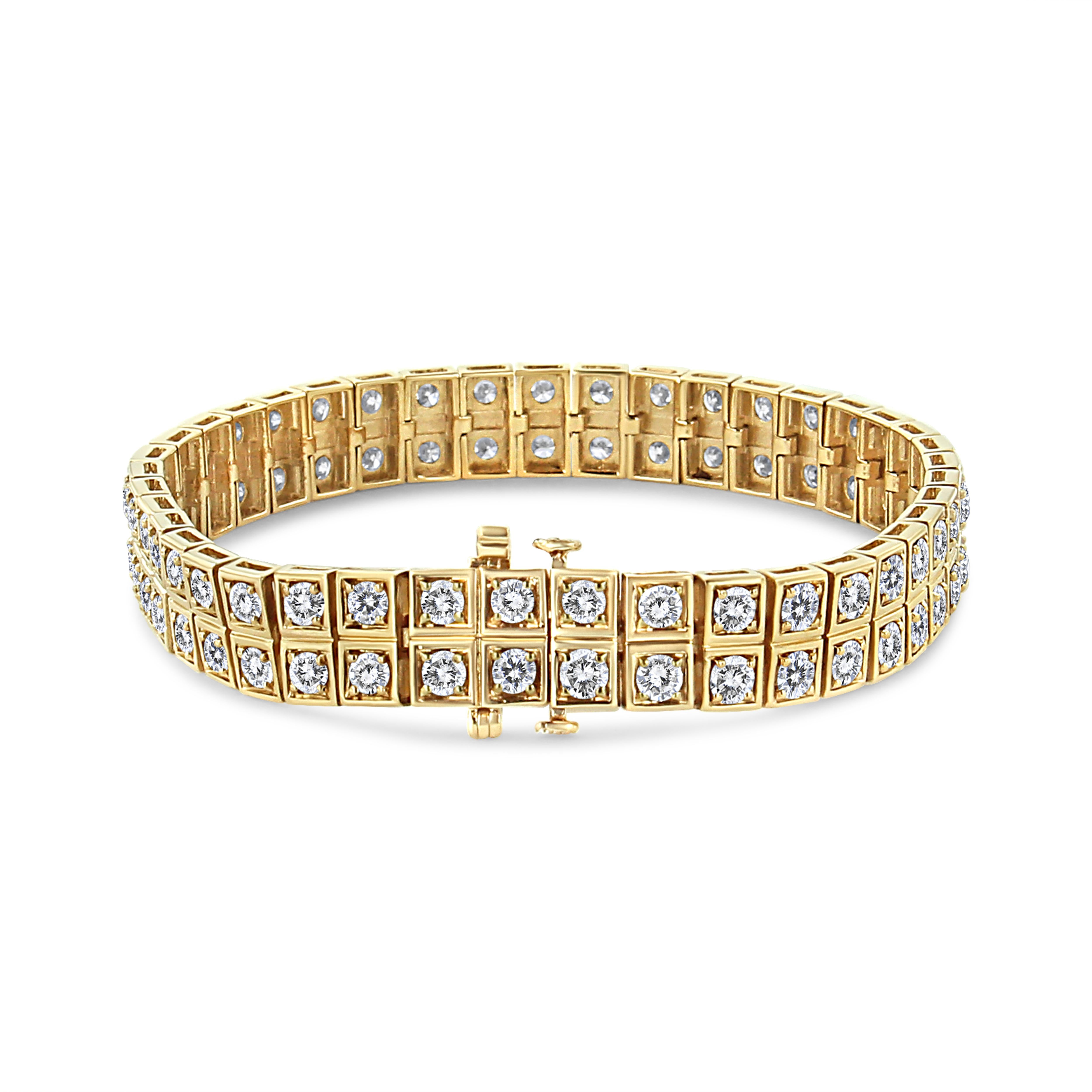 Eye-catching and glamorous, this stunning link bracelet is embellished with a dazzling 8 carats of natural, breathtaking diamonds. Double stacked rows of round-cut diamonds shine in gleaming 10k yellow gold. 8 carats of natural diamonds shine in an