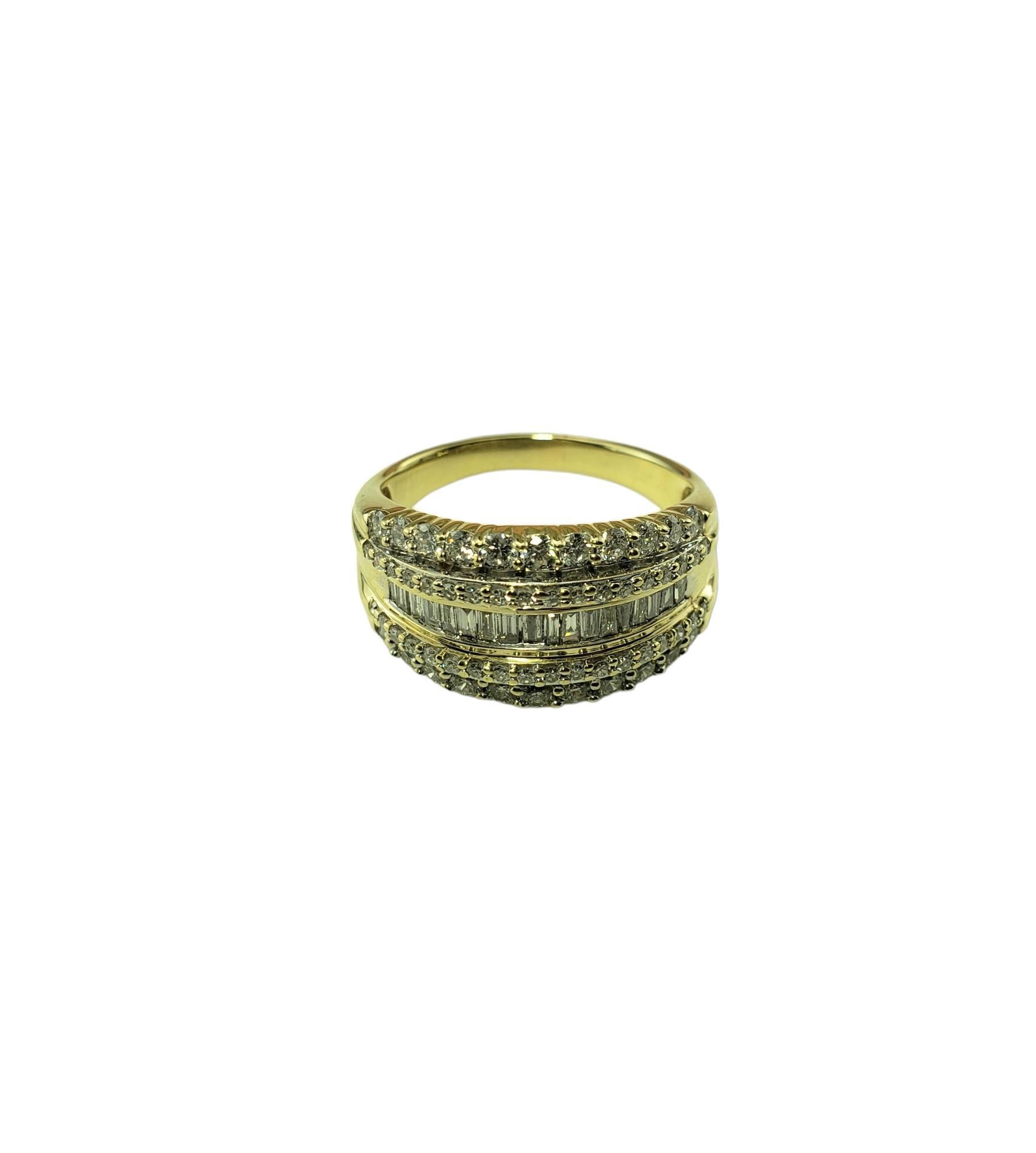 Vintage 10K Yellow Gold and Diamond Band Ring Size 7.5 JAGi Certified-

This sparkling band features 18 baguette diamonds, 22 round brilliant cut diamonds* and 36 round single cut diamonds set in classic 10K yellow gold. Width:  10.6 mm.  
Shank: