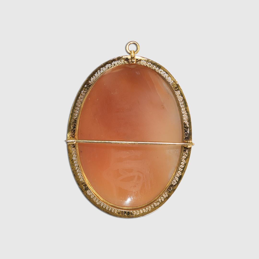 Antique 10k yellow gold and shell cameo brooch & pendant.
The gross weight is 20 grams.
There is a thick gold bezel with fine filigree metalwork.
The bezel tests 42% gold with an XRF metals analyzer.
The conch shell is hand-carved and finely