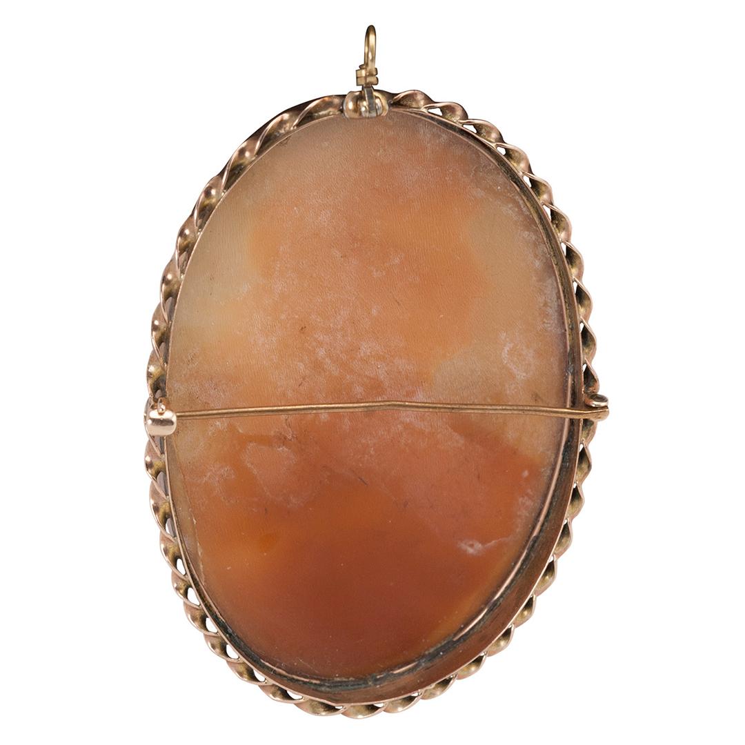 This is a 10k yellow gold antique seashell carved cameo of classic maiden.
This piece is extremely well made with stunning fine detailed carving.
This cameo is set in 10k bezel and is designed to be worn as a brooch or a pendant.
This cameo appears