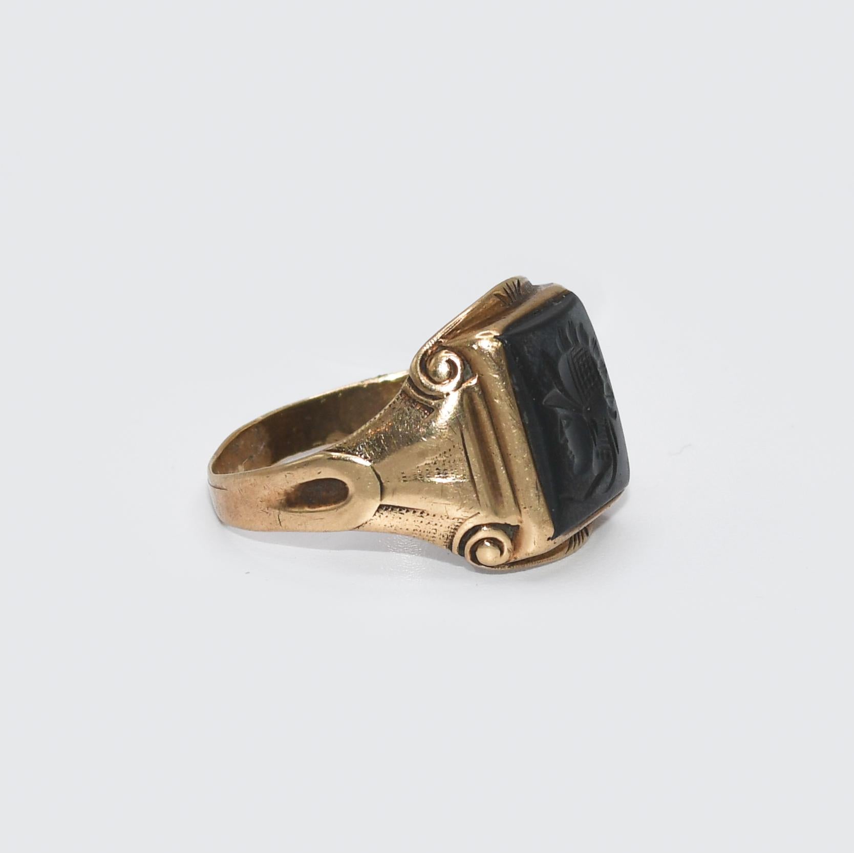 Antique 9k Yellow Gold Hematite signet ring.
Tests 9k with a electronic tester.
Ring Size  is 11.75 and can be sized to a maximum of 10 for an extra fee.
Good condition!
The shank is a bit wavy but fits great
11x13mm