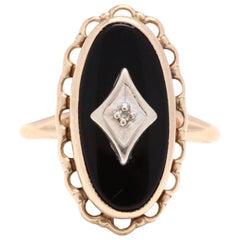ovaler Ring aus 10 Karat Gelbgold mit schwarzem Onyx und Diamant
