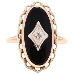 10 Karat Yellow Gold Black Onyx and Diamond Oval Ring