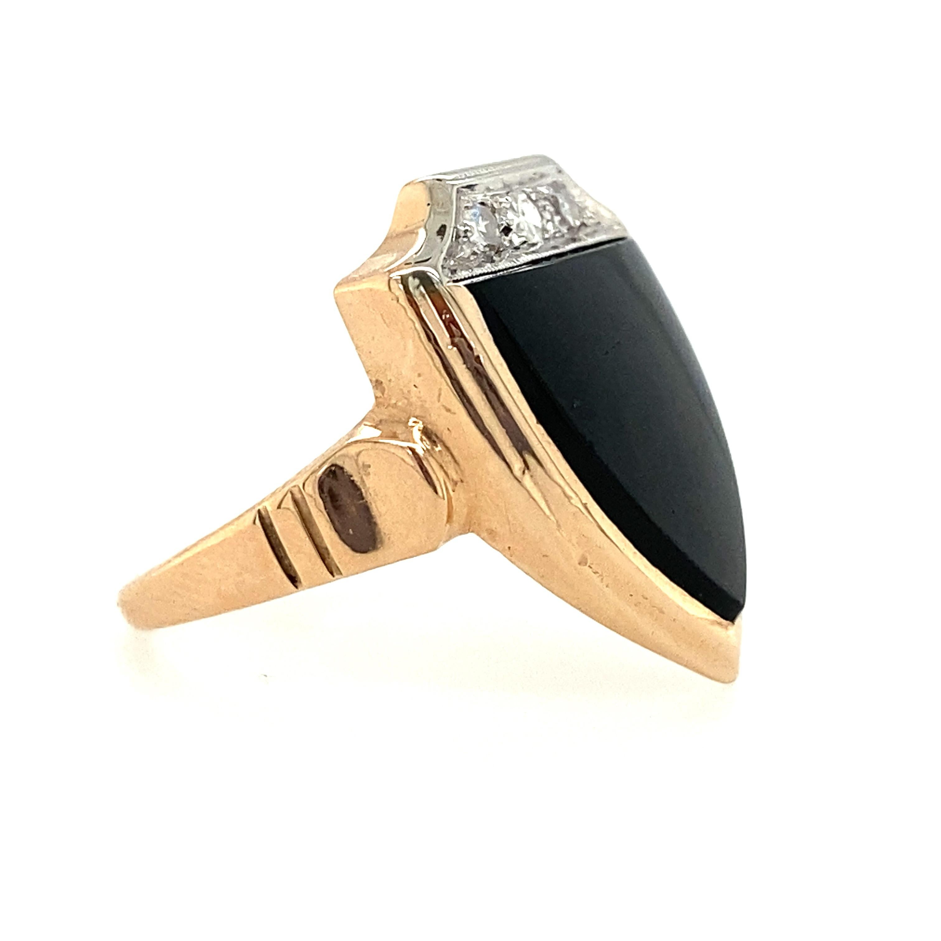 Glossy black onyx is the centerpiece of this shield ring, and it is topped with 3 diamonds with H-I color and VS2-SI1 clarity 0.10TCW single cut diamonds. This ring is perfect if you feel like you need a little extra protection, a battle jewel, and