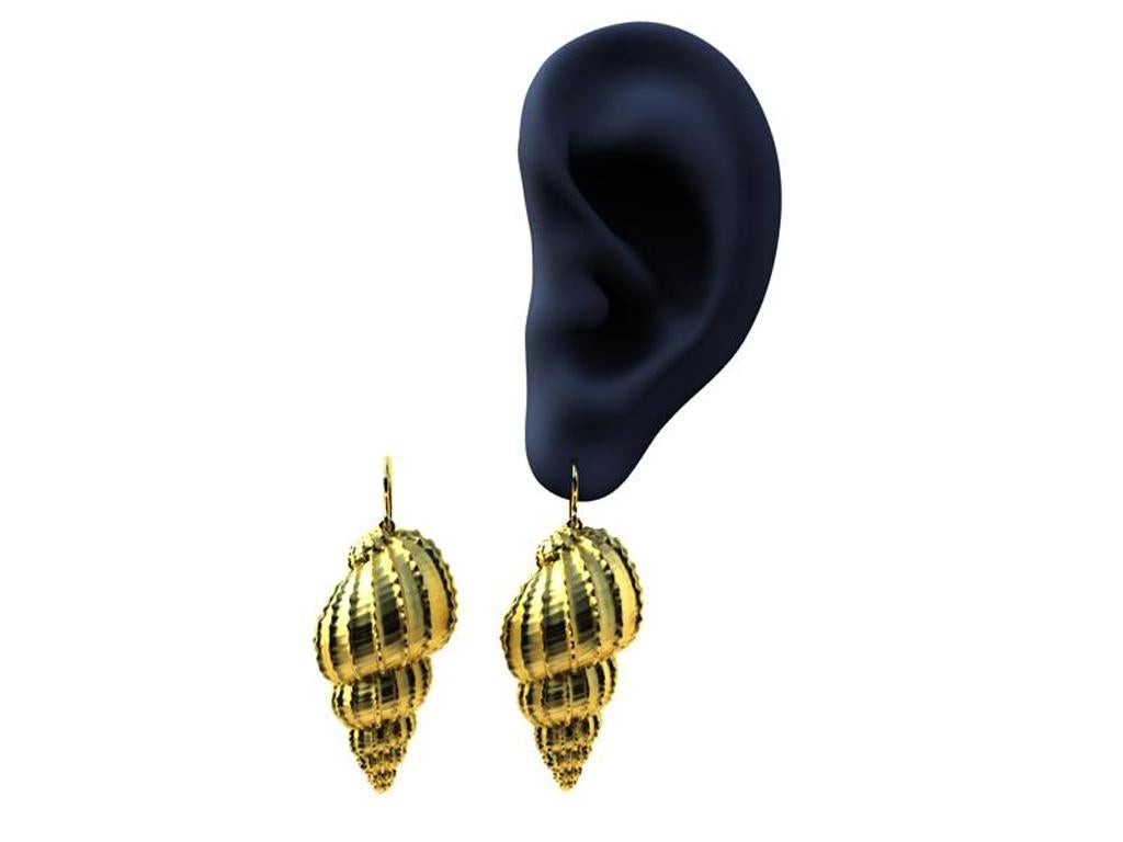 10k Yellow Gold  Bulbous Shell Earrings, The Ocean Series , Ear style #2  In time for the Summer  beach nights.  With vertical bumps to accentuate this shell . Shell is just over 1 inch or 28 x 15 mm . With hook 40mm .
Matte finish. Made to order