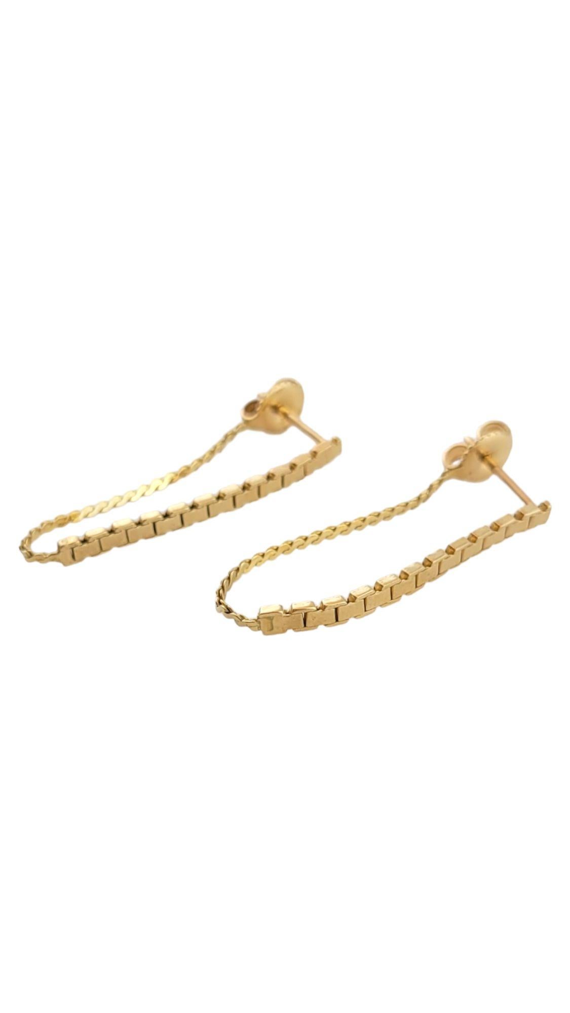 These yellow gold earrings feature a hanging chain loop.

Size: 30.7 mm X 12.3 mm

Weight: 2.6 g/ 1.6 dwt

Tested 10K

Very good condition, professionally polished.

Will come packaged in a gift box or pouch (when possible) and will be shipped U.S.