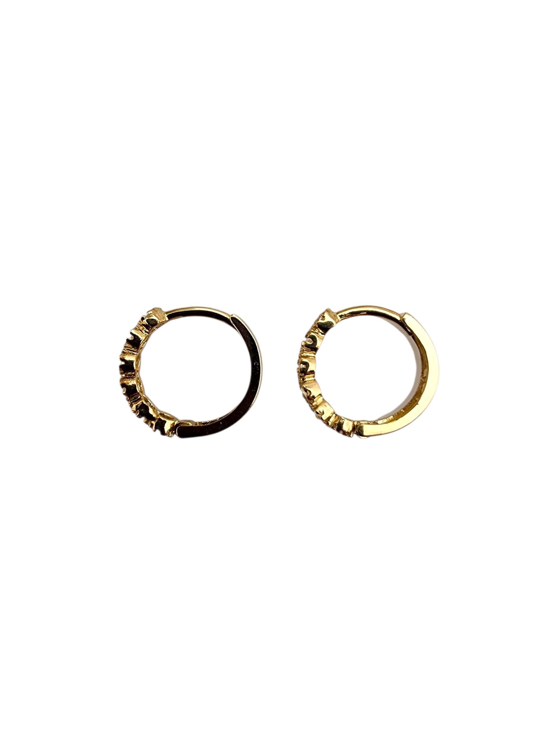 10K Yellow Gold CZ Mini Hoop Earrings

Sleek and subtle, these 10K yellow gold mini hoops are perfect for everyday wear with just the right touch of shine.

Size: 11.7 mm x 2.3 mm x 1 mm

Weight: 0.45 gr./ 0.29 dwt.

Stamped: 10K

Very good