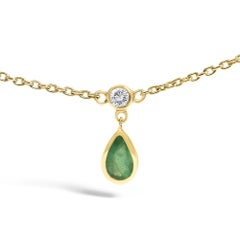 10K Yellow Gold Dangling 5x3 mm Green Emerald and Diamond Station Necklace