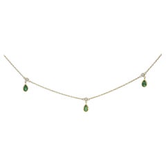 10K Yellow Gold Dangling 5x3 mm Green Emerald and Diamond Station Necklace