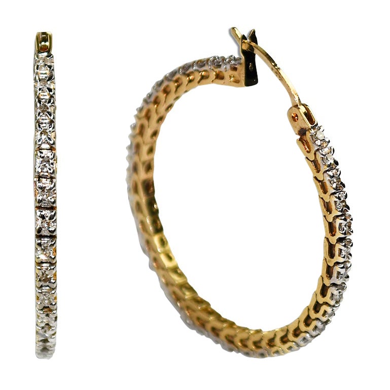Orecchini a cerchio con diamanti in oro giallo 10K 0,25ct in vendita