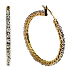 Orecchini a cerchio con diamanti in oro giallo 10K 0,25ct