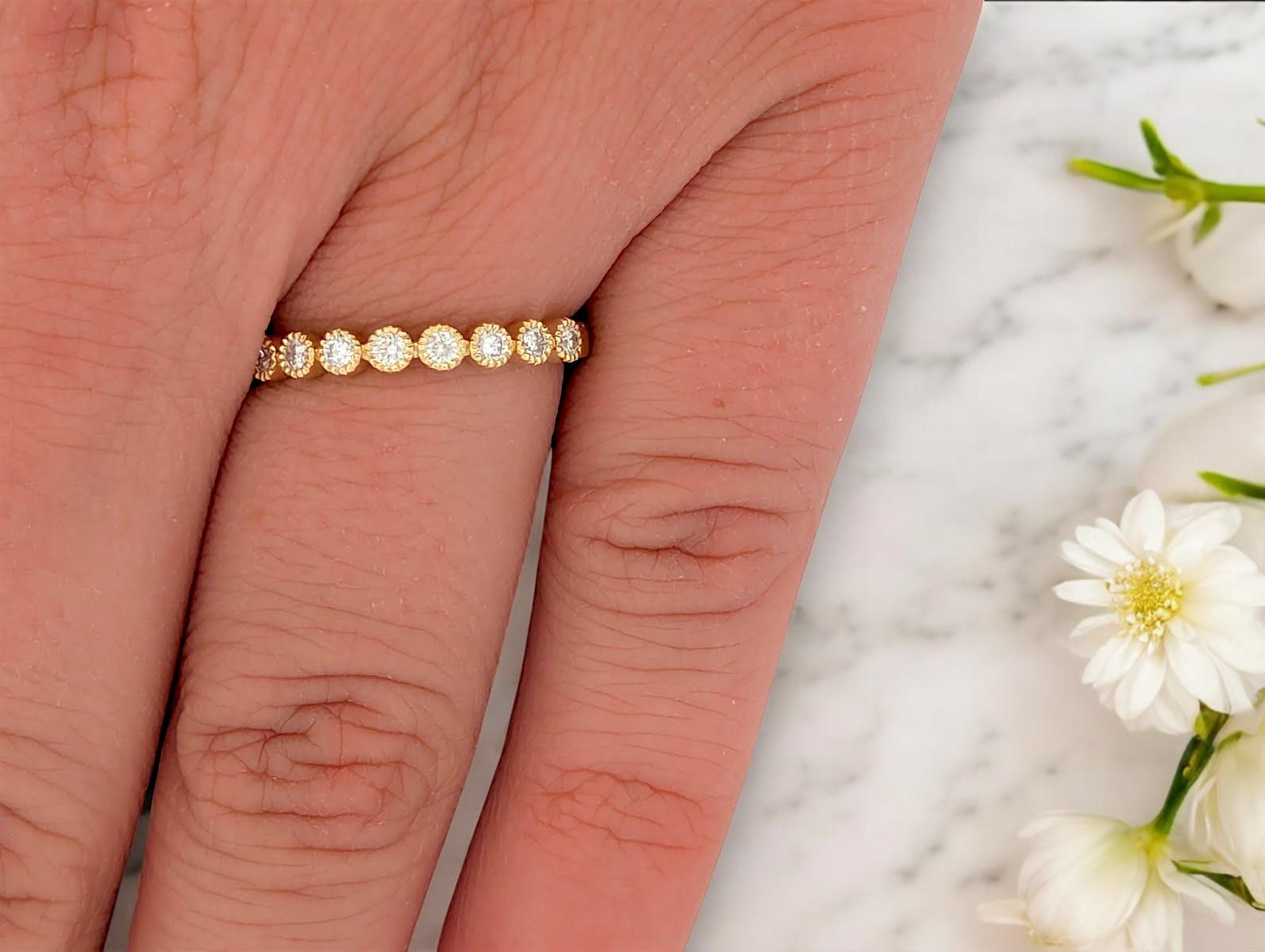 Celebrate elegance and timeless charm with this exquisite 10k yellow gold diamond ring, thoughtfully crafted in ring size 7. Featuring .22 carats total weight (CTW) of natural diamonds, this stunning band is finished with intricate milgrain