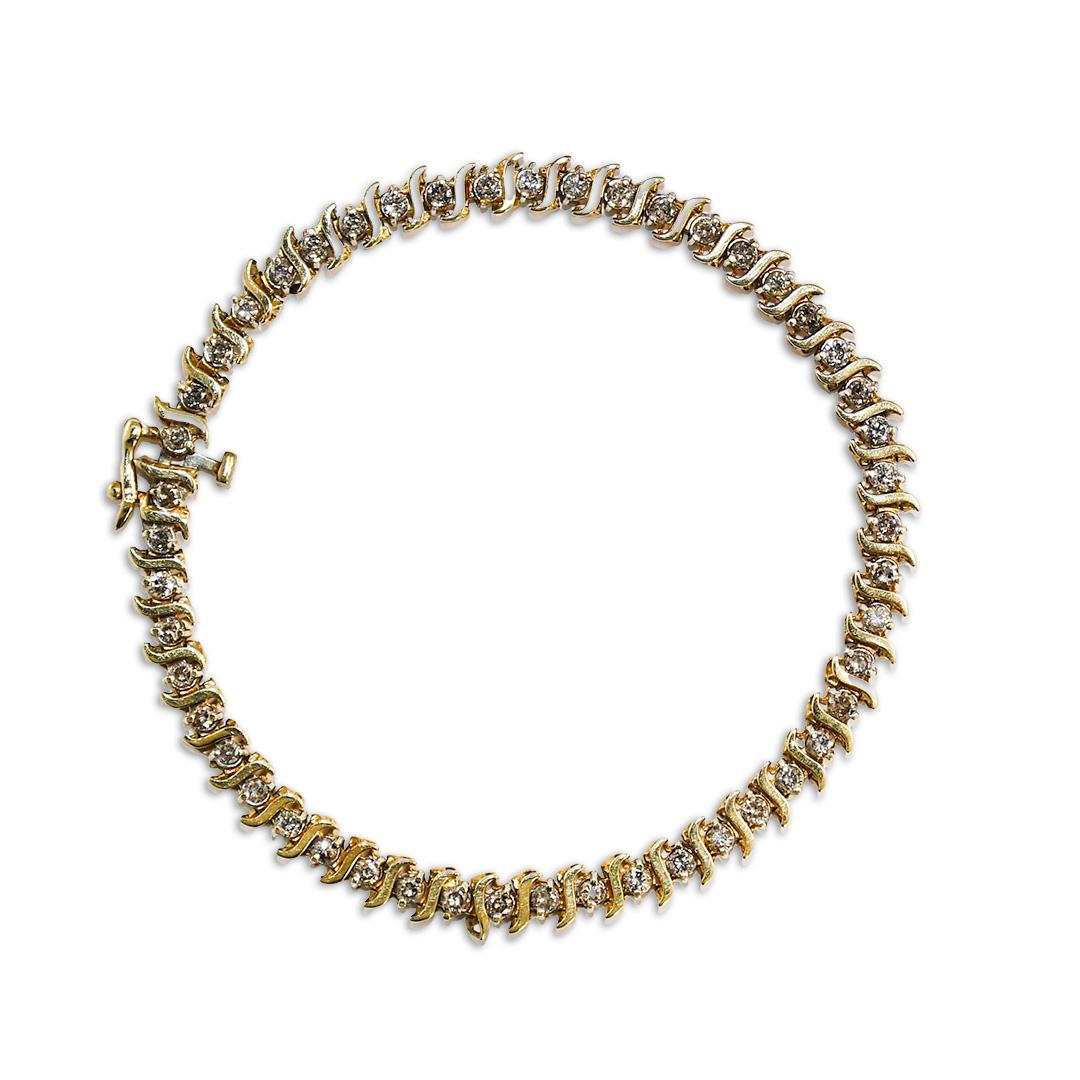 Bracelet de tennis en or jaune 10K avec diamants 1.00tdw, 7.5". en vente