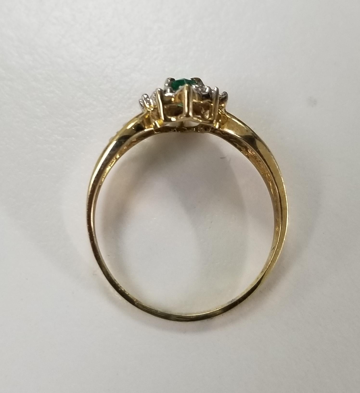 Marquise Cut 10 Karat Yellow Gold Emerald and Diamond Ring