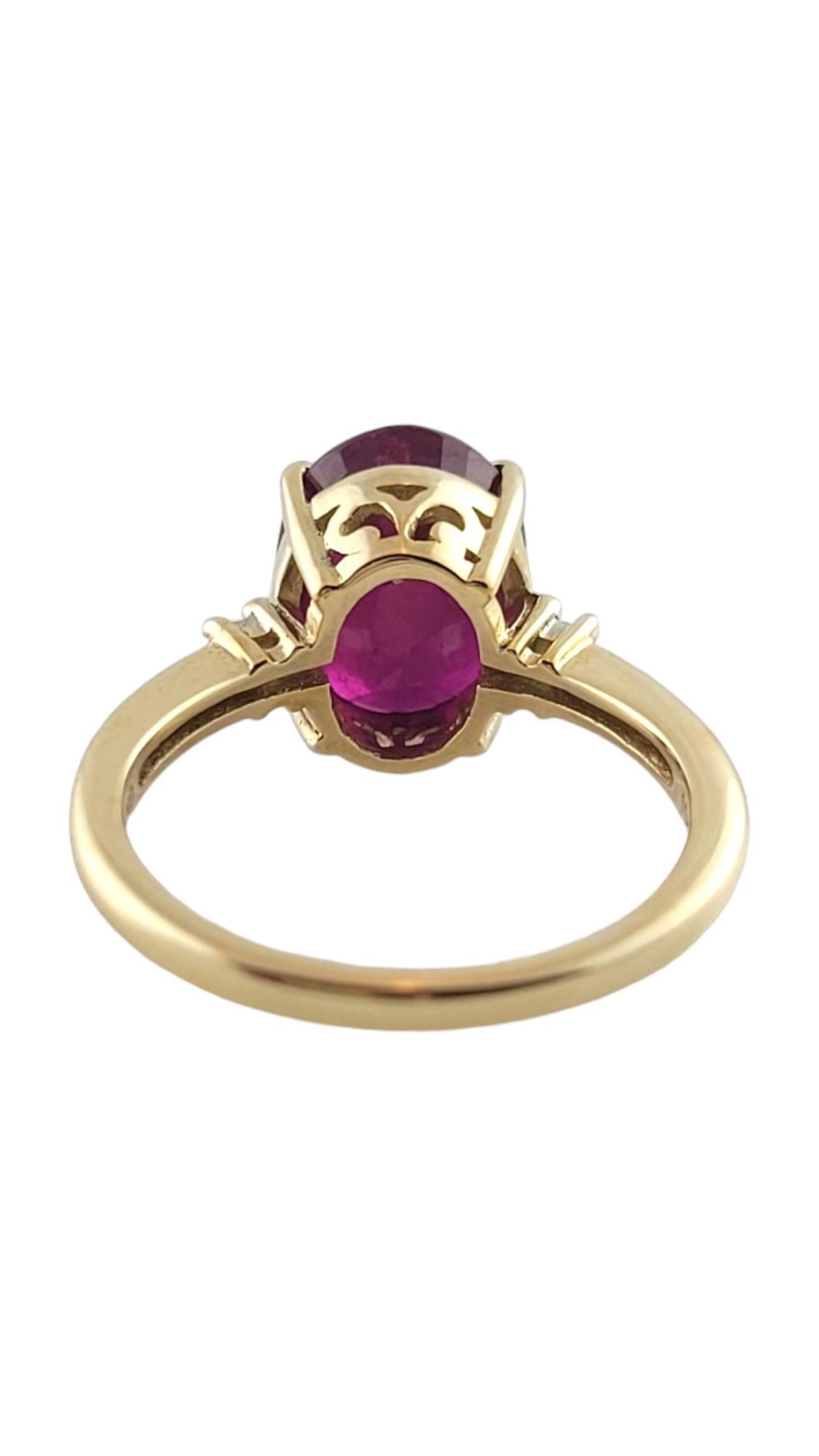 Anillo de oro amarillo de 10 quilates con rubí relleno de vidrio Tamaño 5,25 #18076 Corte oval en venta