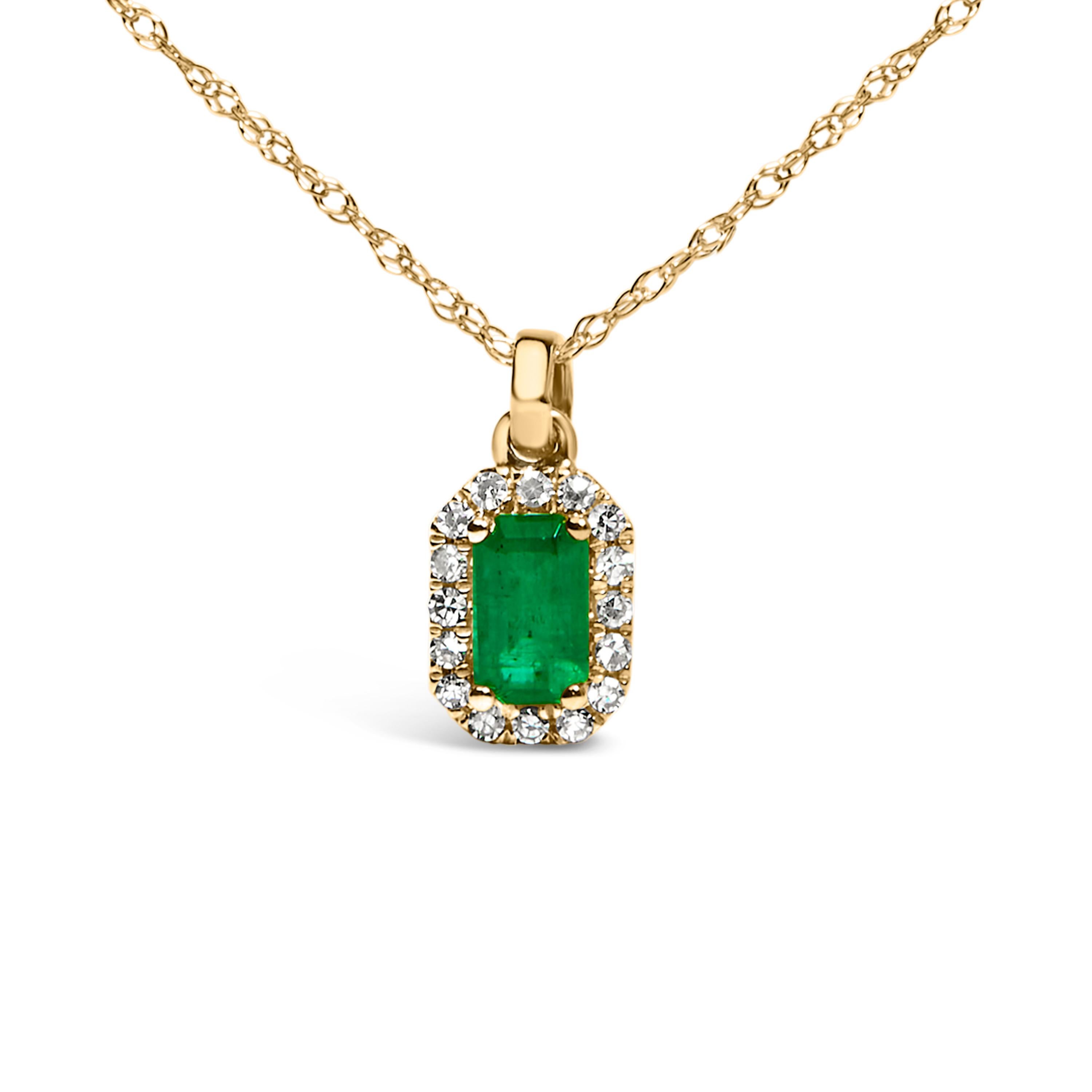 Crafted from radiant 10K yellow gold, this exquisite necklace boasts a naturally sourced, octagonal green emerald, its vivid hues reminiscent of spring's first bloom. Measuring a graceful 5x3mm, this gemstone is meticulously framed by a heavenly