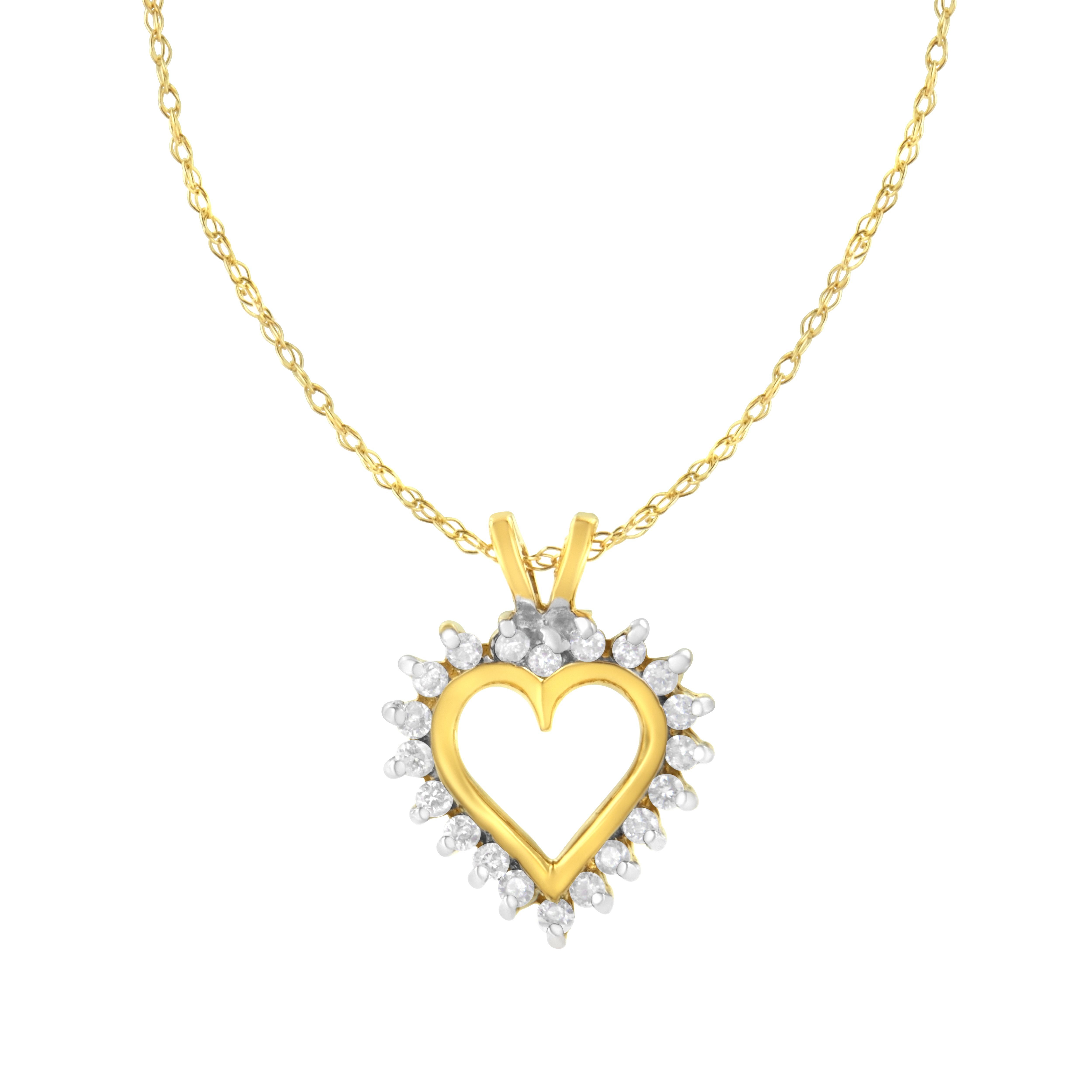 Envelop your love in this magnificent Open Heart Diamond Pendant. This icy fiery 10 karat yellow gold pendant is embellished with 20 glittering round cut diamonds in perfect prong setting and dangles from an elegant rope chain. Total diamond weight