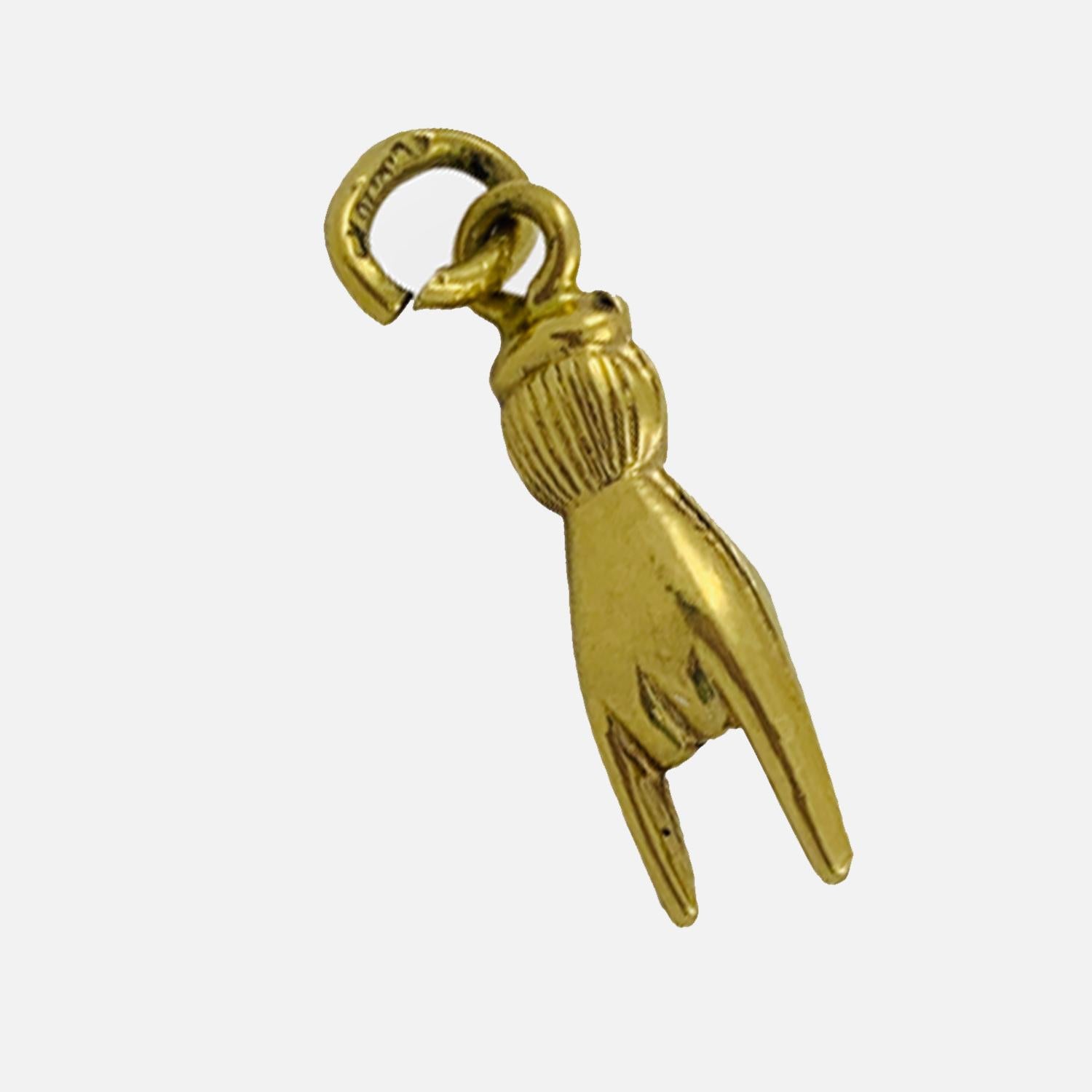 Vintage Italian 'Mano Cornuto' Good Luck Hand Charm circa 1930-40's

Crafted of 10K yellow gold, this literal good luck charm is perfect for any charm bracelet or necklace. The charm features the iconic 'Mano Cornuto' or 'Horned Hand' from Italian