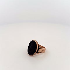 10K Yellow Gold Onyx with Face Carved and Flanked sides