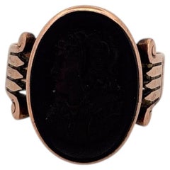 10K Yellow Gold Onyx with Face Carved and Flanked sides