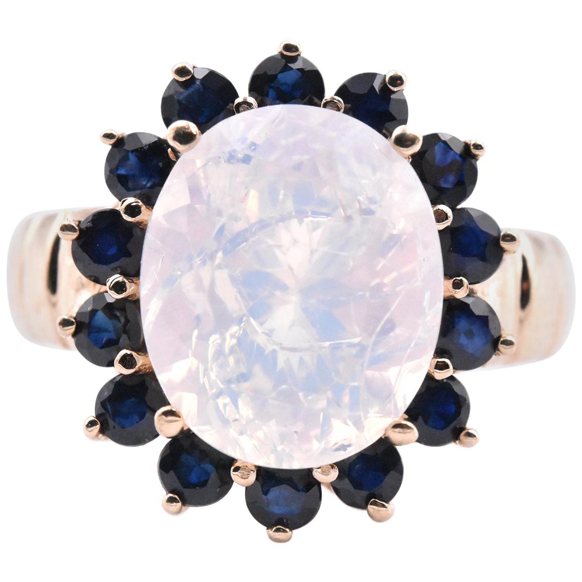 10 Karat Yellow Gold Opal and Sapphire Halo Ring