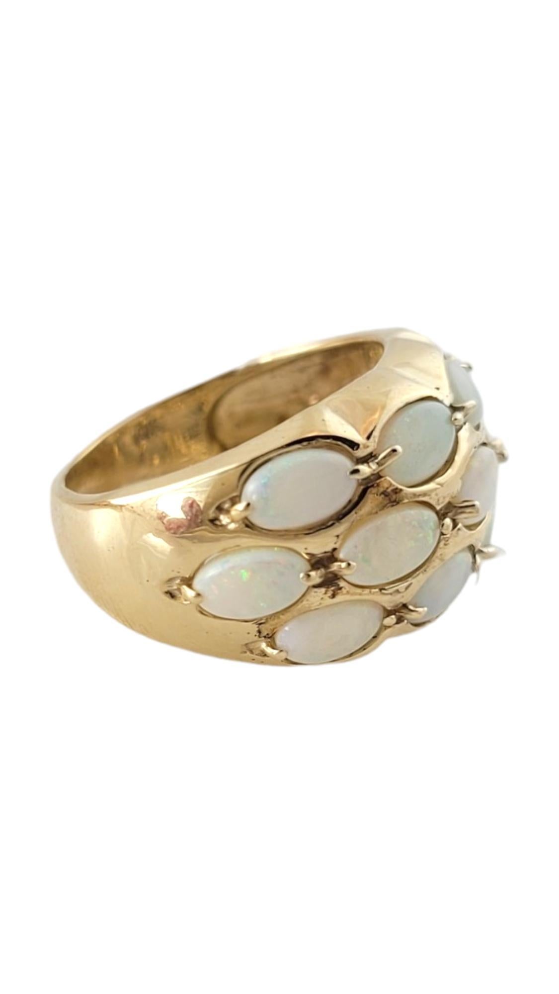 Vintage 10K Yellow Gold Opal Band Ring Size 4.5

This gorgeous 10K gold band ring features 13 sparkling opal stones for a breathtaking look!

Ring size: 4.5
Shank: 3.1mm
Front: 21.7mm X 11.9mm X 4.7mm

Weight: 2.7 dwt/ 4.1 g

Hallmark: 10K

Very