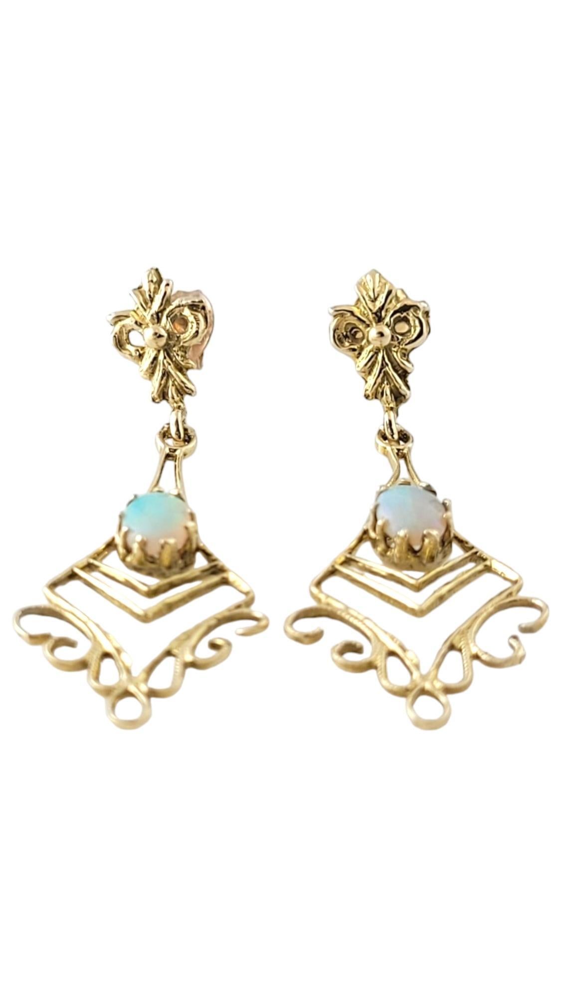 Vintage 10K Yellow Gold Opal Dangle Earrings

This beautiful set of 10K gold dangle earrings features 2 gorgeous opal stones in a stunning design!

Size: 41.0mm x 15.2mm X 4.0mm

Weight: 1.8 dwt/ 2.8 g

Tested 10K

Very good condition,
