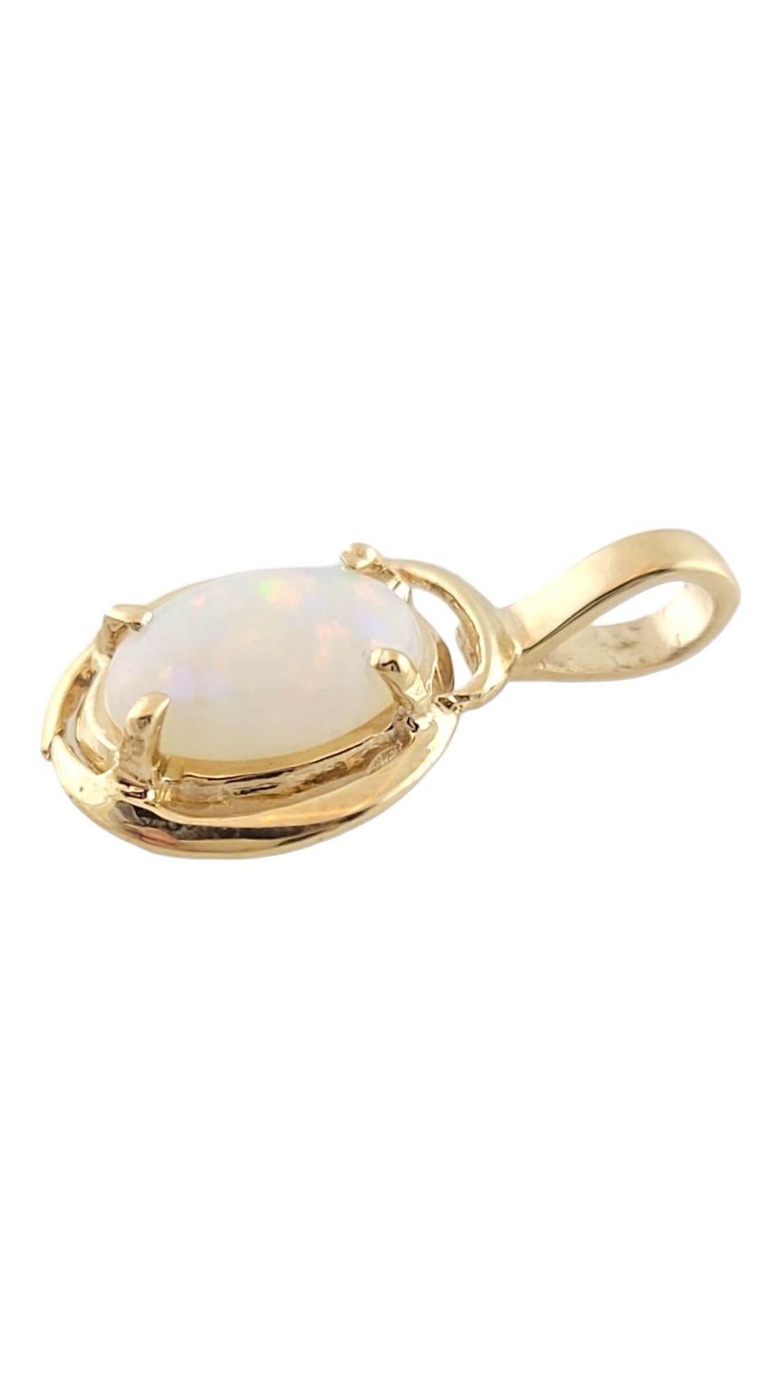Vintage 10K Yellow Gold Opal Pendant #16174

This gorgeous pendant features a beautiful white opal stone set in 10K yellow gold!

Size: 17.9mm X 10.3mm X 3.0mm

Weight: 0.8 g/ 0.5 dwt

Hallmark: 415

Very good condition, professionally