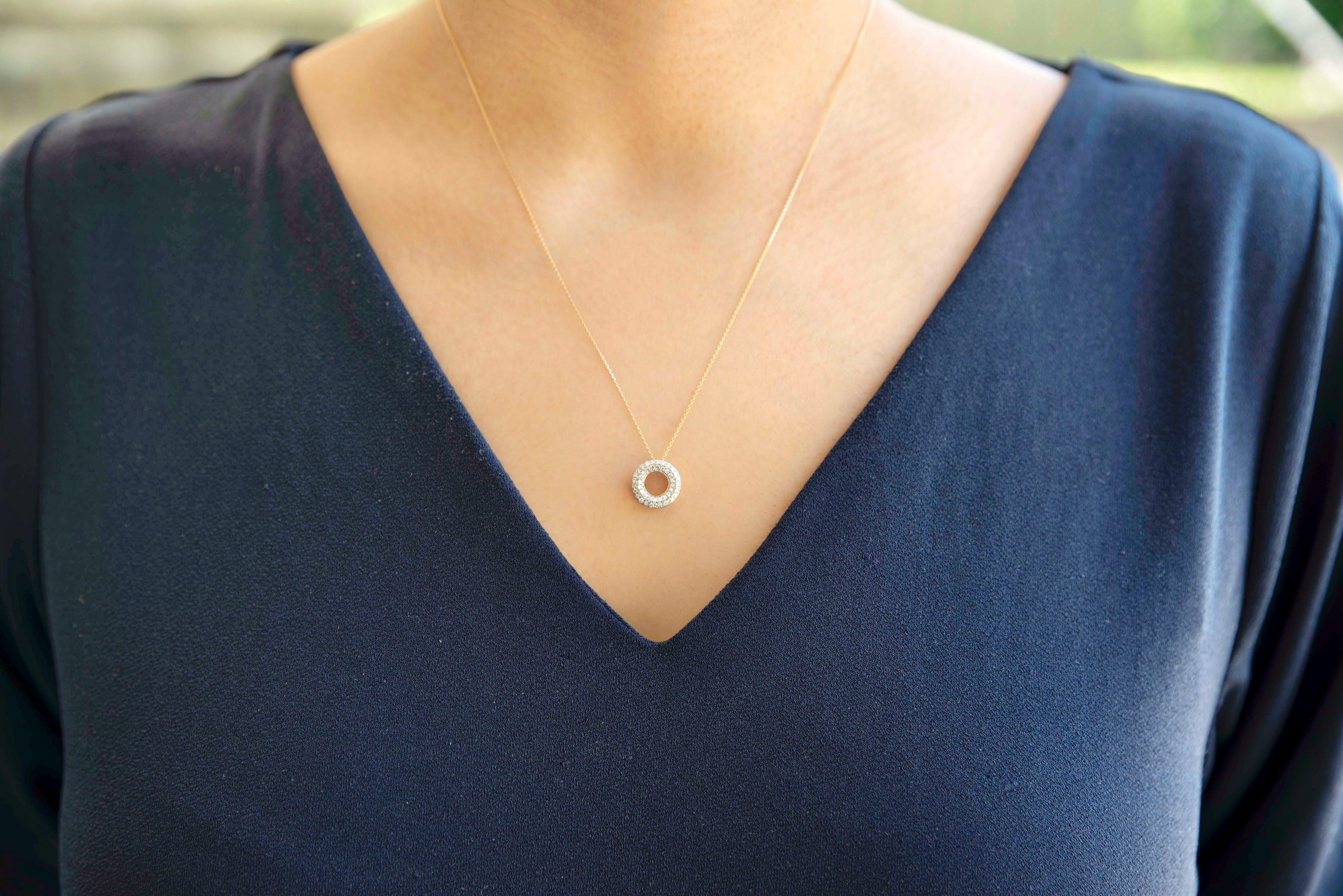 10K Yellow Gold Open Circle Diamond Pendant. Wear it alone or a layering necklace.

Chain length 18