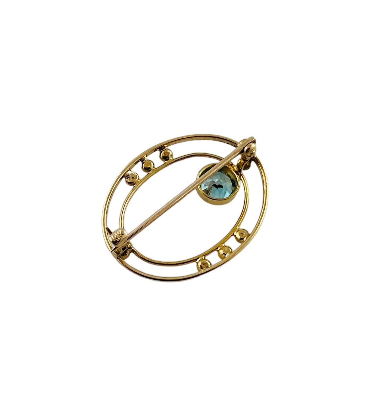 10K Yellow Gold Open Oval Blue Zircon Brooch

This beautiful pin is set in 10K yellow gold. 

The pin is accented by a bezel set faceted light blue zircon stone

Size 27.2 x 21.1 x 4.2 mm

2.1 g / 1.3 dwt

Acid Tested for 10K

Very good preowned