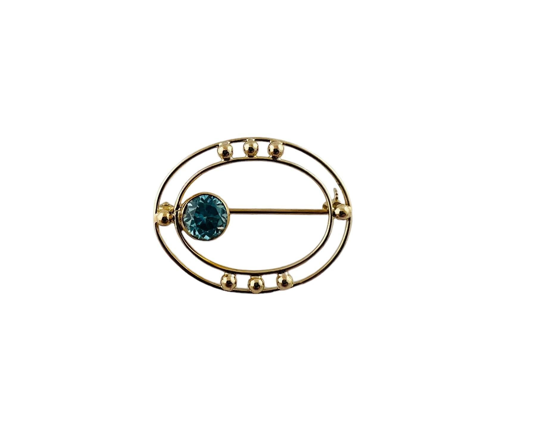 Taille ovale Broche ouverte en or jaune 10 carats avec zircon bleu ovale n° 15684 en vente