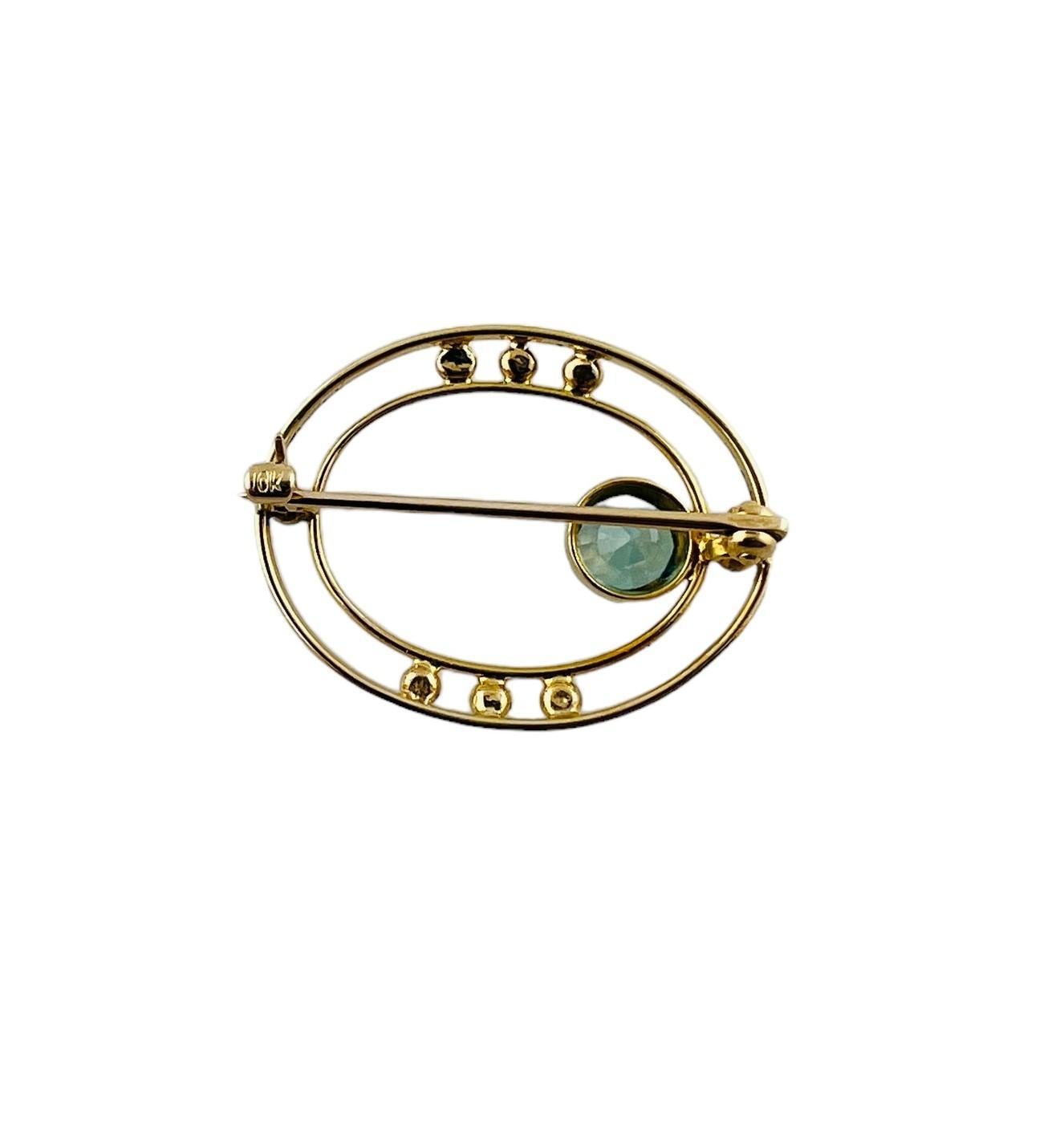 Oval Cut 10K Yellow Gold Open Oval Blue Zircon Brooch #15684 For Sale