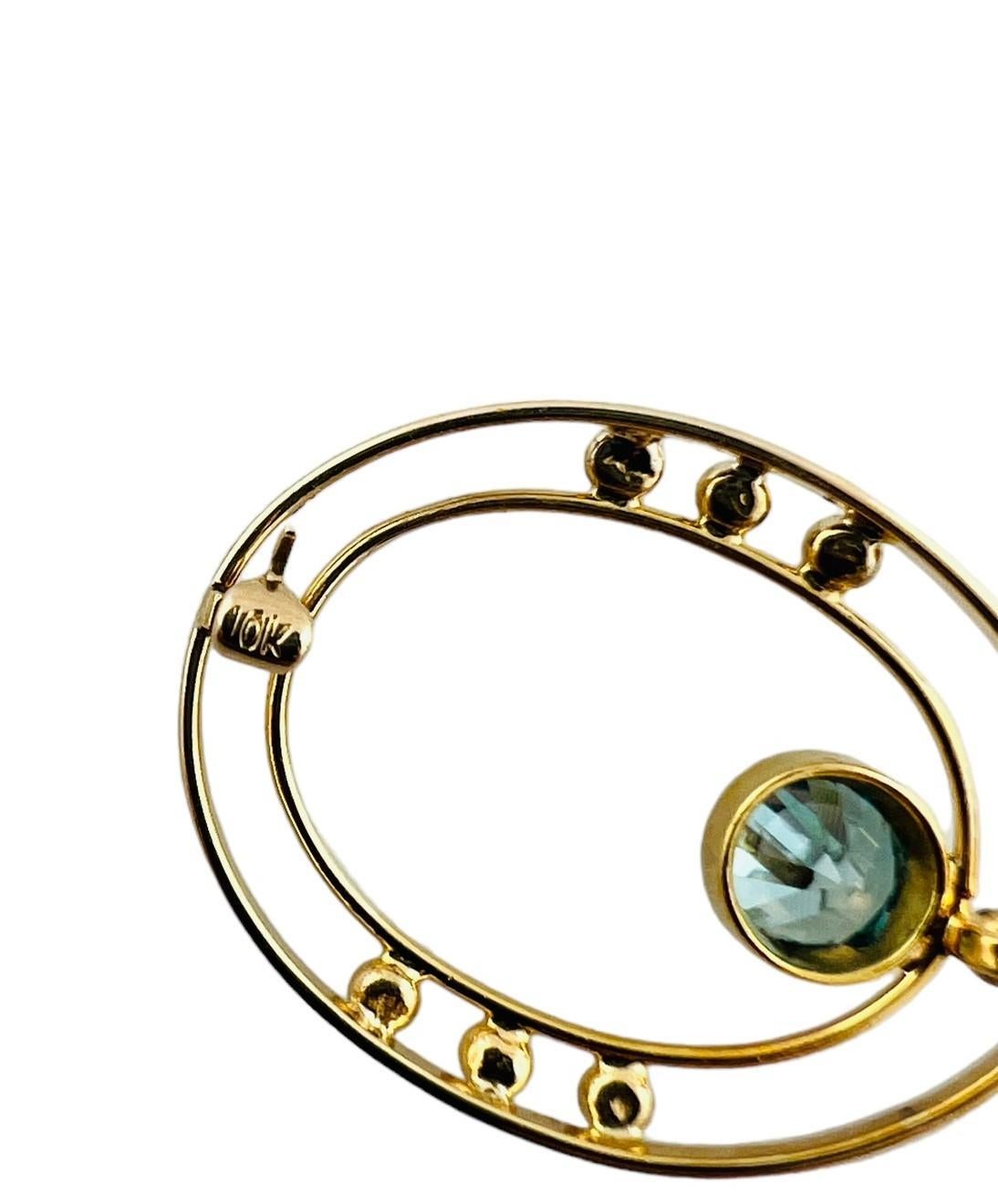 Broche ouverte en or jaune 10 carats avec zircon bleu ovale n° 15684 en vente 1
