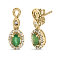 10K Yellow Gold Oval Cut Green Emerald 5x3mm and 1/7 Cttw Diamond Dangle Earring