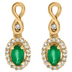 10K Yellow Gold Oval Cut Green Emerald 5x3mm and 1/7 Cttw Diamond Dangle Earring