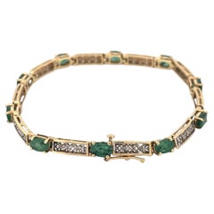 10K Gelbgold Ovaler Smaragd 1,5ct und Diamant 0,05ct Tennisarmband