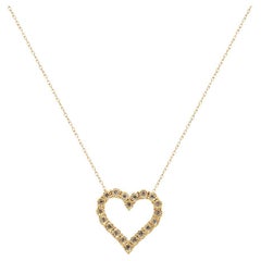 Collana con ciondolo a cuore in oro giallo 10k e argento con diamante champagne da 1/2 carato
