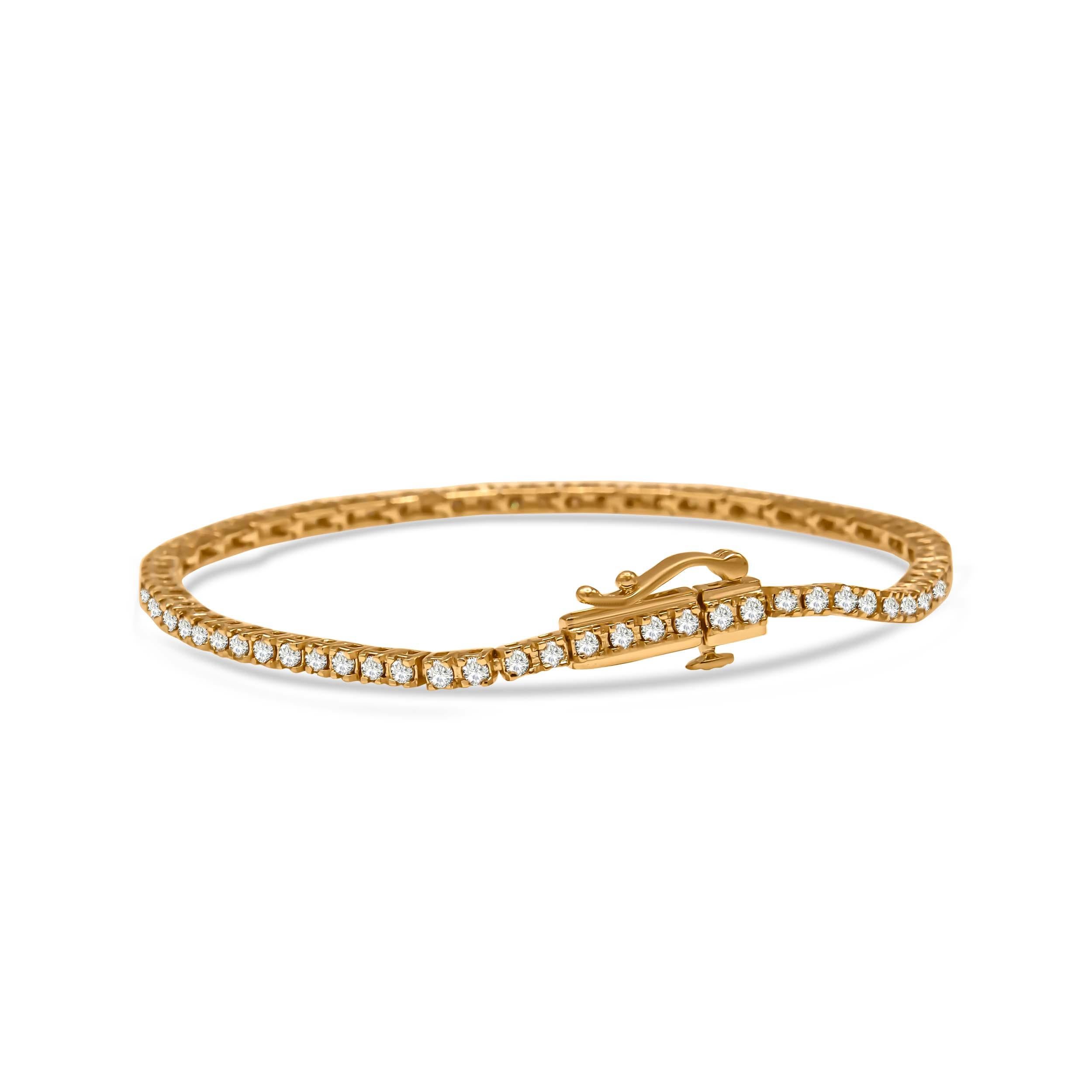 You may already own a tennis bracelet in your collection, but here’s one that’s not to be missed. Unlike the typical bracelet, this piece starts with a 10K yellow gold plated .925 Sterling Silver base that strikingly juxtaposes against the natural