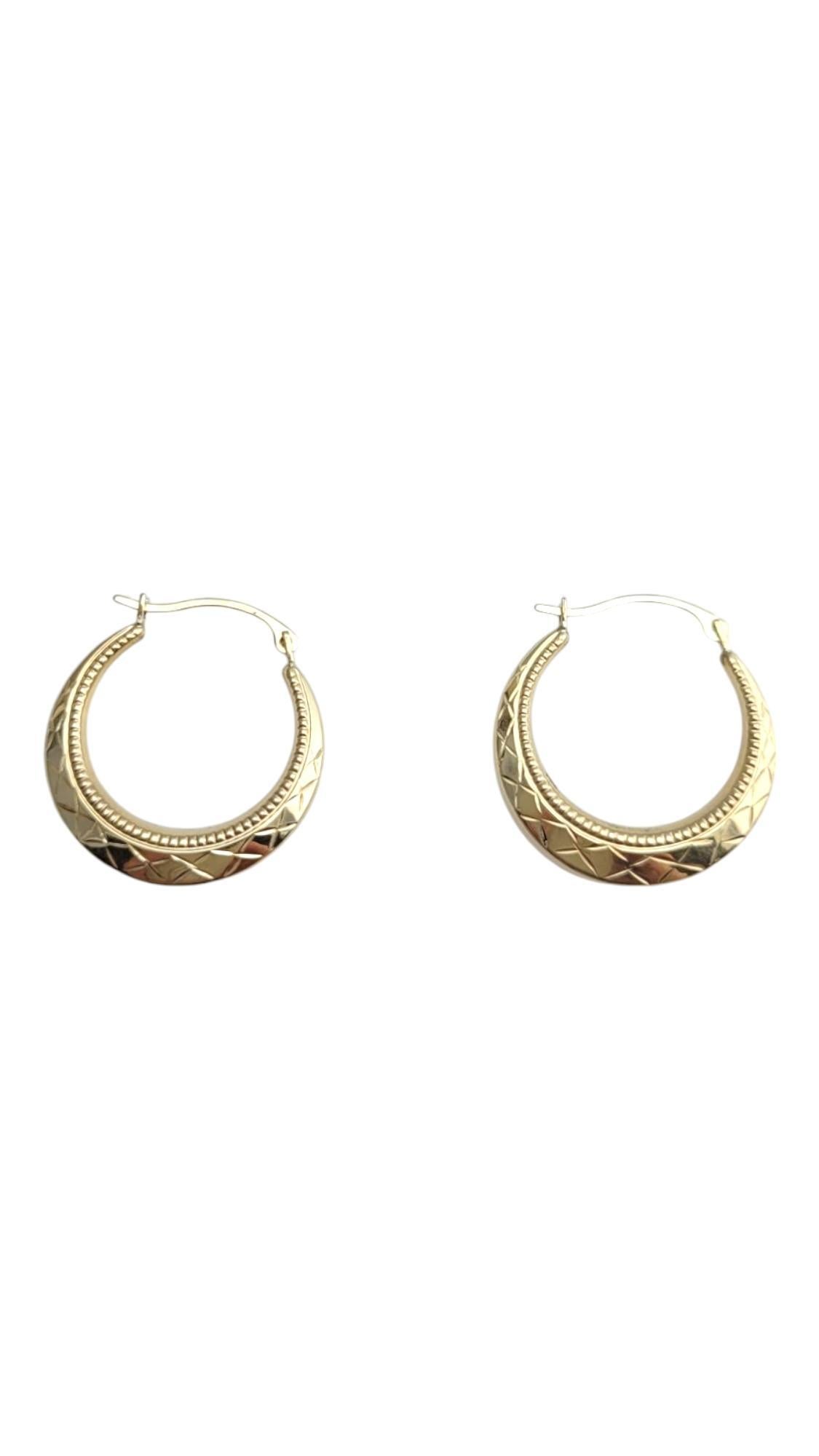 10K Yellow Gold Hoop Earrings

These hoops are meticulously detailed with an 