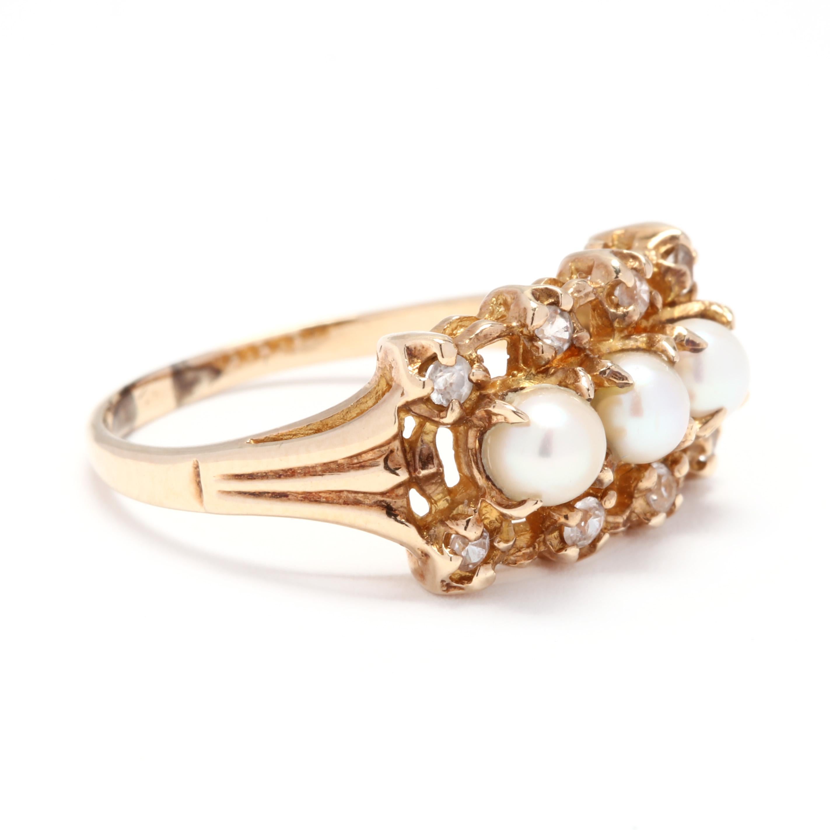 A vintage 10 karat yellow gold, pearl and diamond ring. This ring features three prong set, round bead white pearls surrounded by eight round cut diamonds weighing approximately .25 total carats and a ridged tapered shank.

Stones:
- pearls, 3