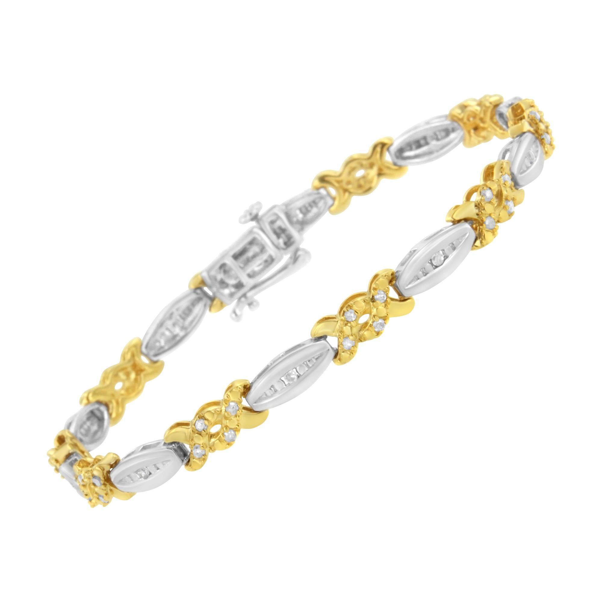 Deux rubans d'or jaune sertis de diamants ronds forment un lien tressé qui s'entrecroise avec une amande en or blanc contenant au centre un diamant unique flanqué d'un motif perlé. Ce magnifique bracelet à maillons en argent sterling plaqué or jaune